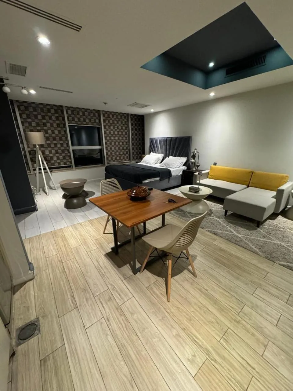 Photo of the whole room, Bed in The Centaurus Apartments