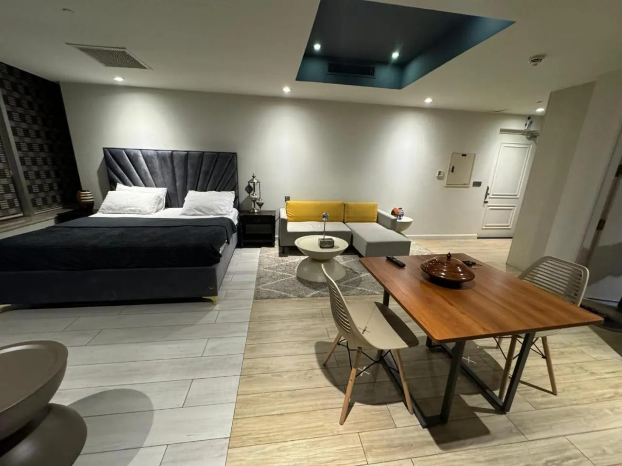 Photo of the whole room, Bed in The Centaurus Apartments