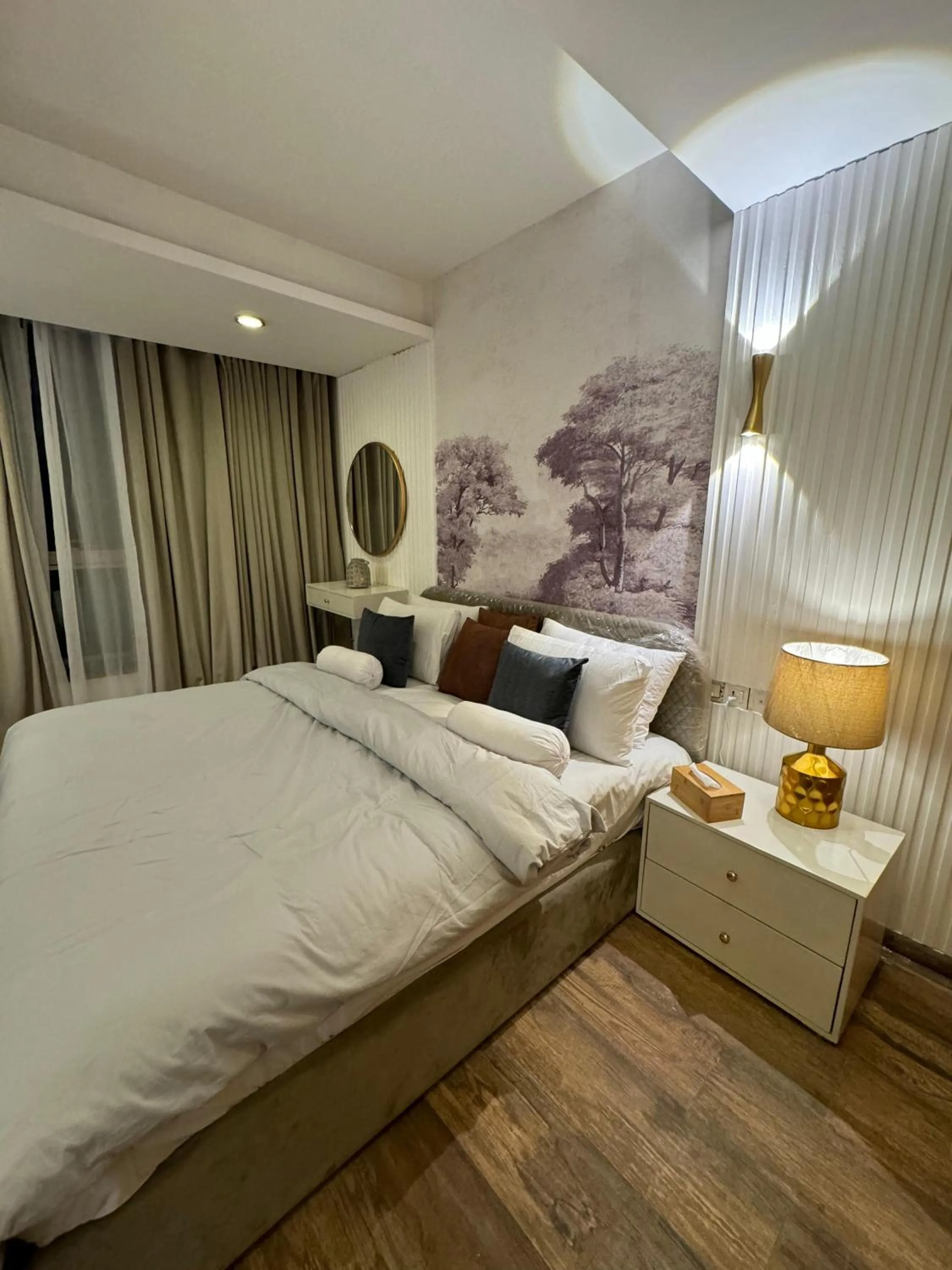 Bed in The Centaurus Apartments