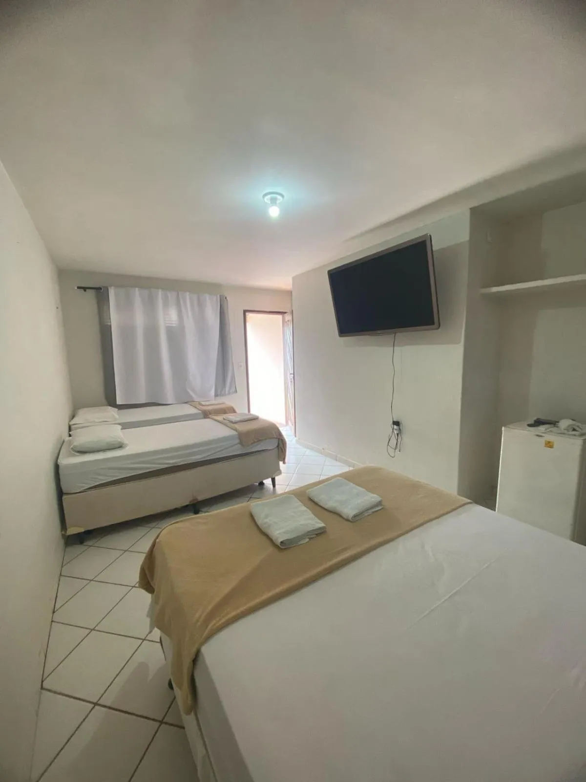 Bed in Pousada Vento Norte