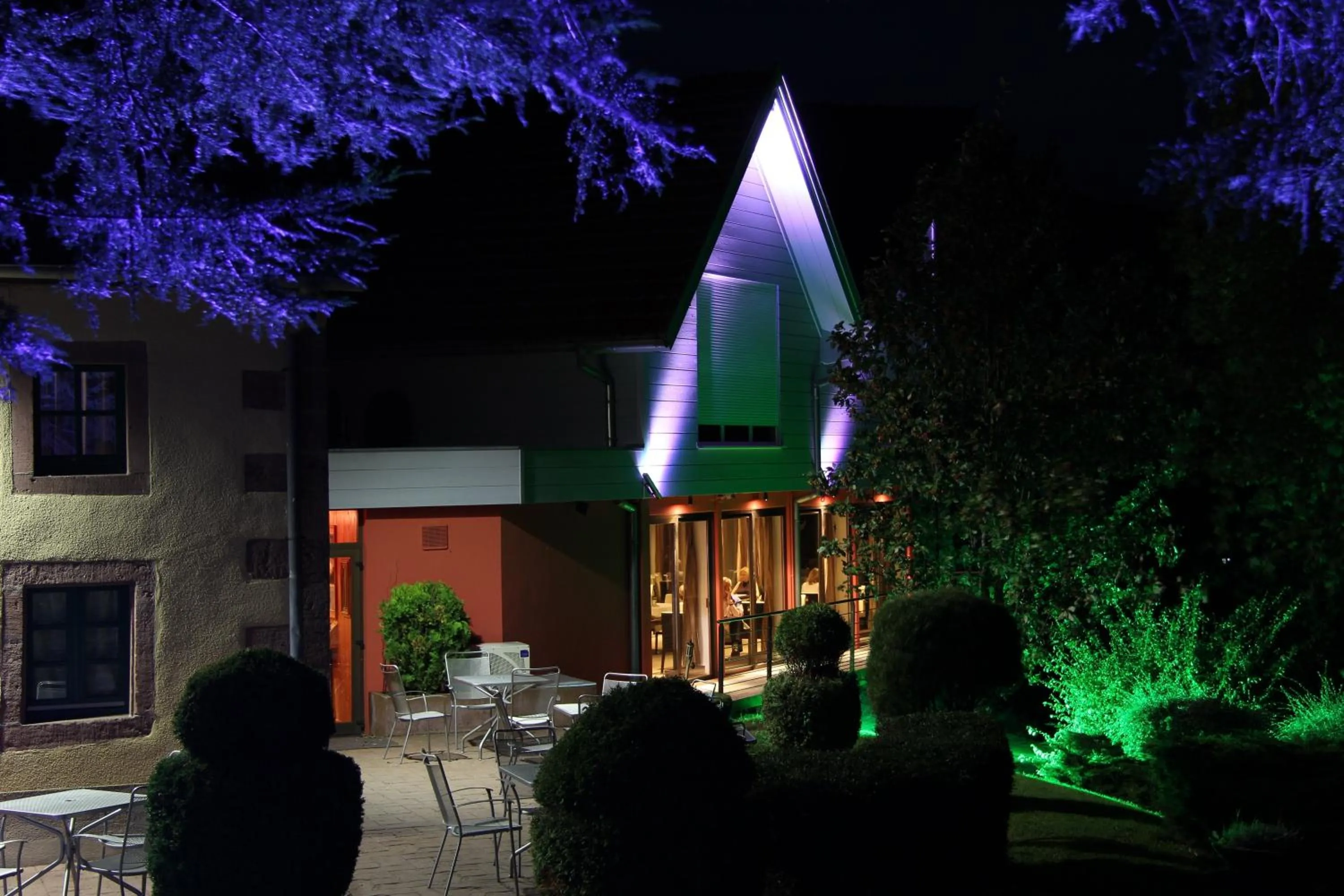 Property building in Hôtel Restaurant Les Alisiers