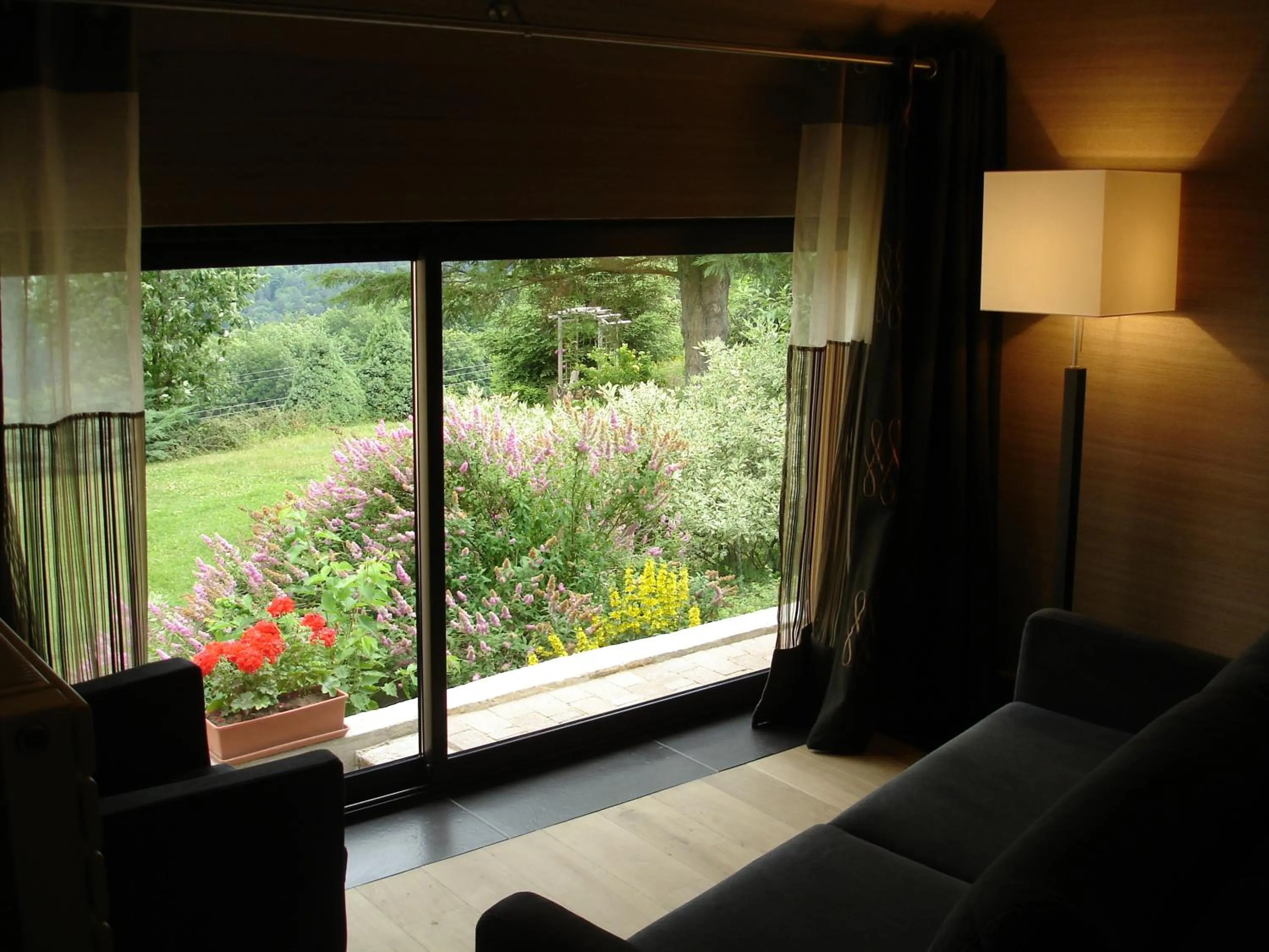 Seating area in Hôtel Restaurant Les Alisiers