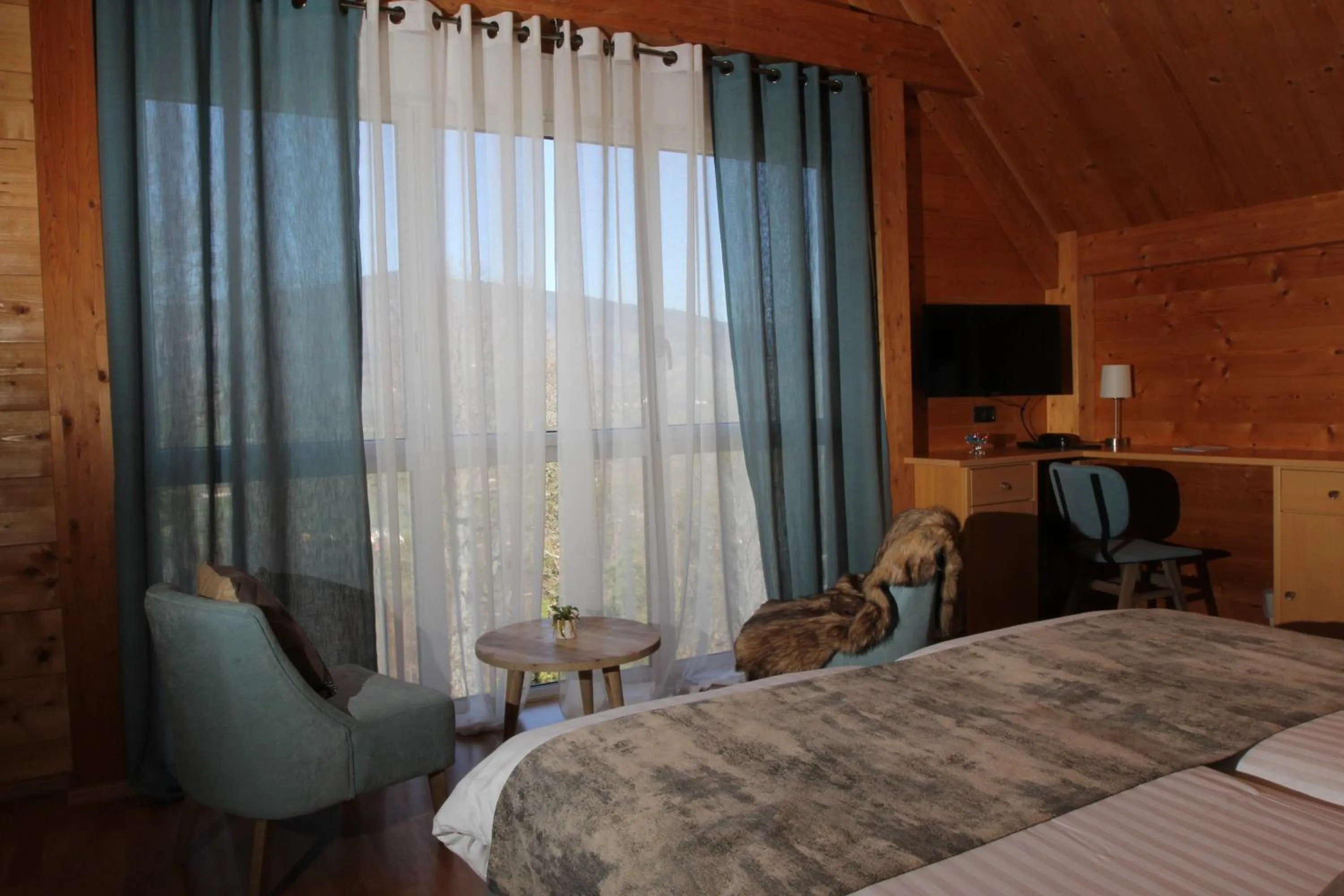 Bedroom in Hôtel Restaurant Les Alisiers