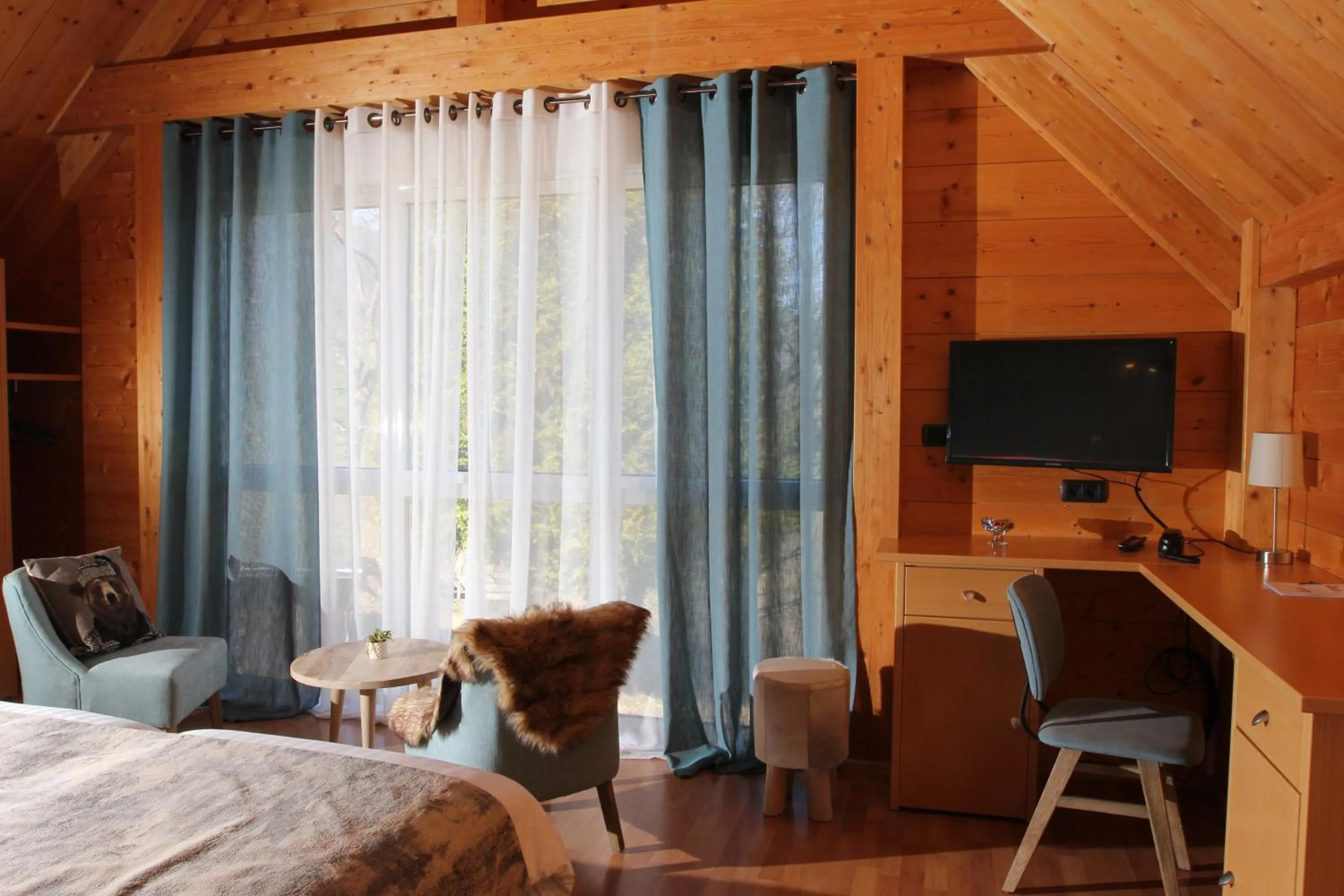 Bedroom in Hôtel Restaurant Les Alisiers