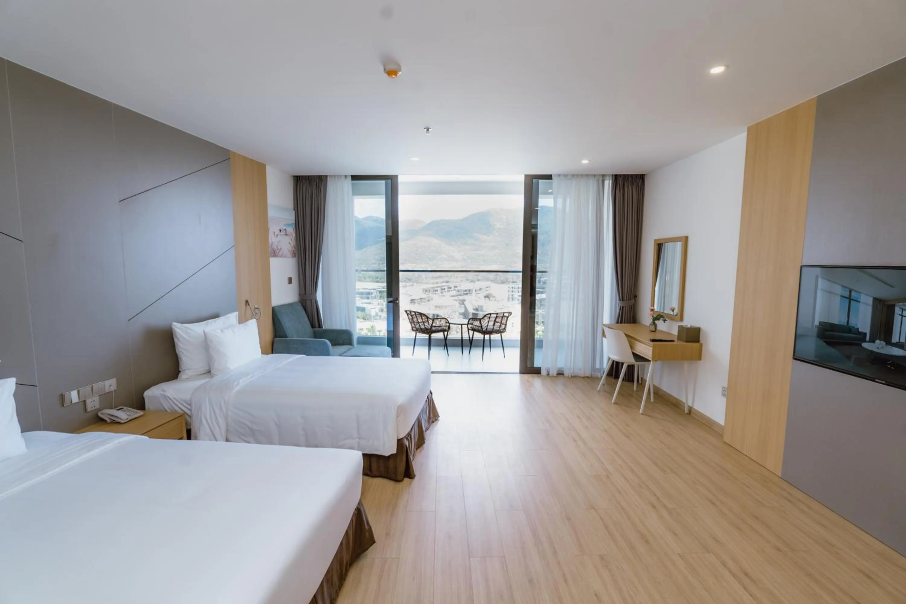 Photo of the whole room, Bed in Aquamarine Cam Ranh By Swandor - All Inclusive