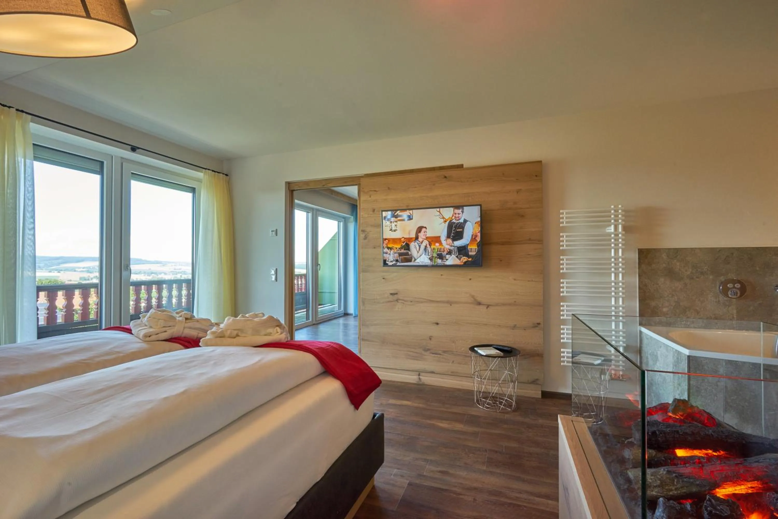 Bathroom, Bed in Wellnesshotel Zum Koch