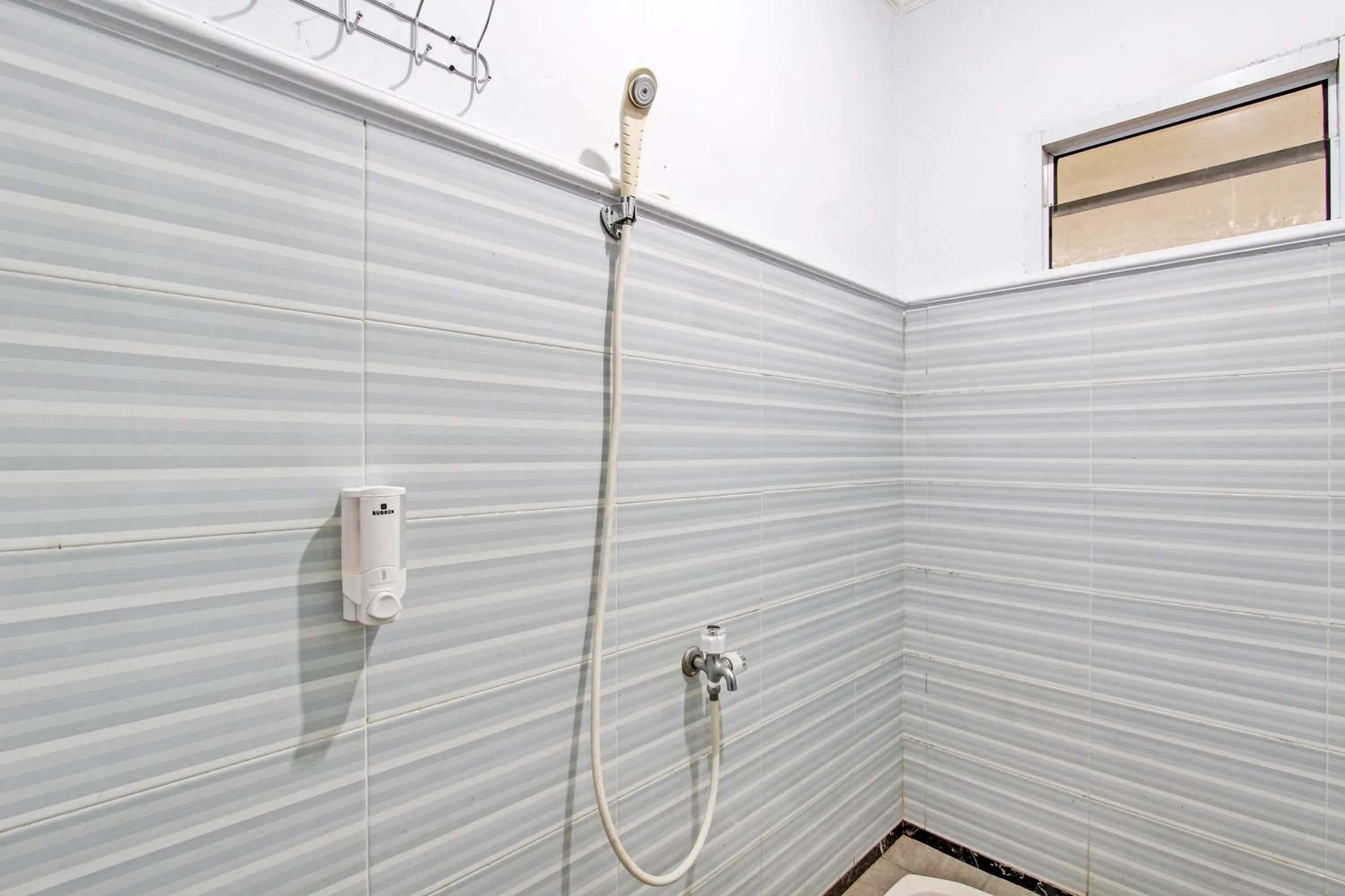 Bathroom in Hotel O Juan Kostel 2