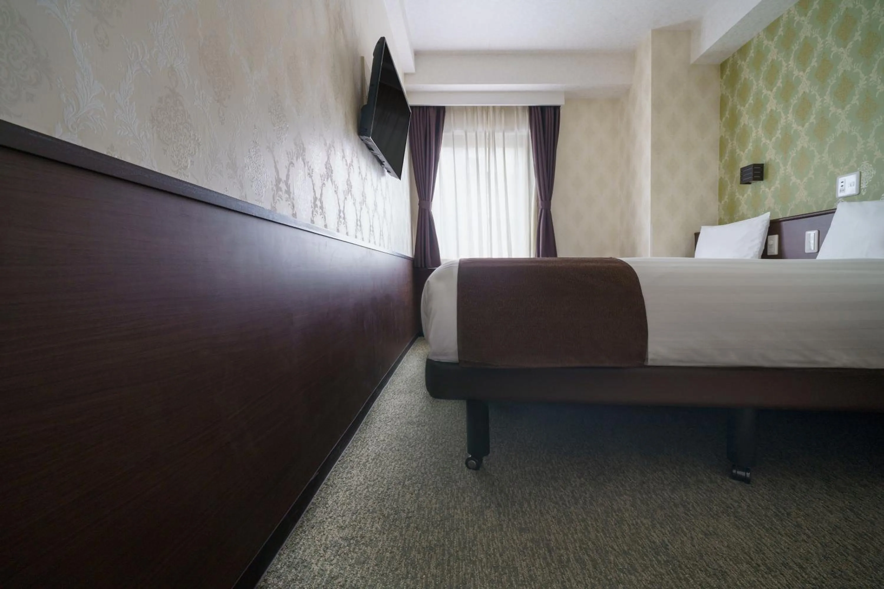 Bed in Hotel Centmain Nagoya