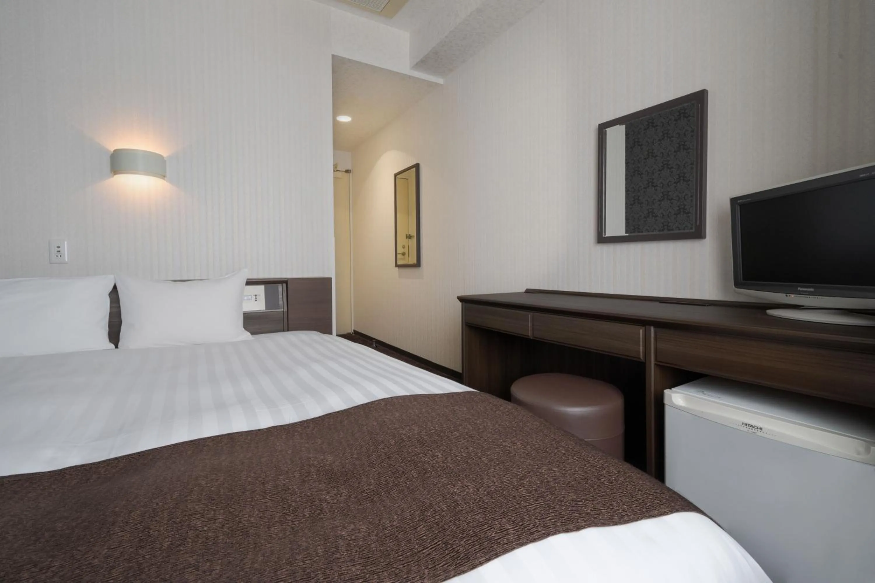 Bed in Hotel Centmain Nagoya