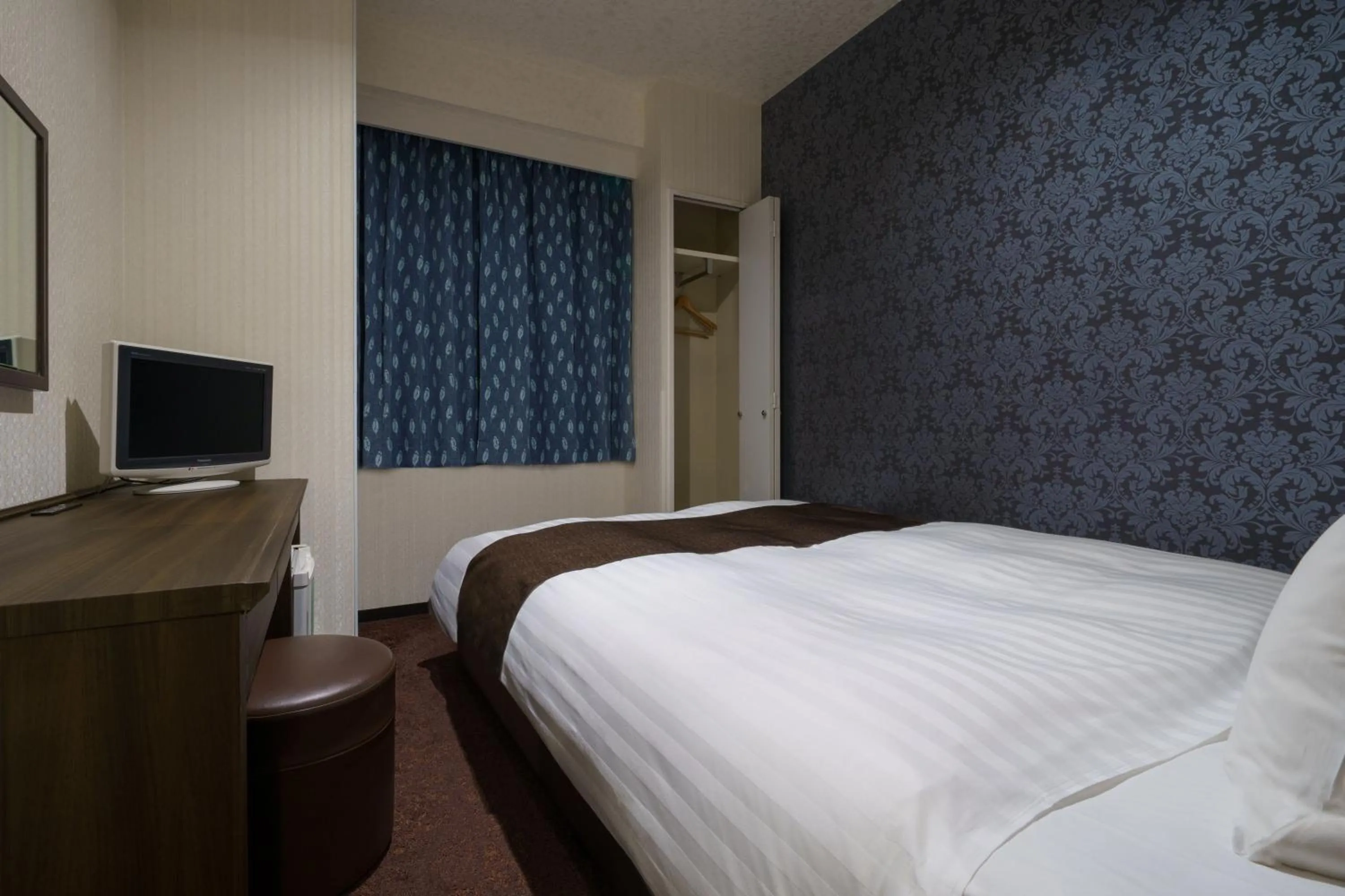 Bed in Hotel Centmain Nagoya