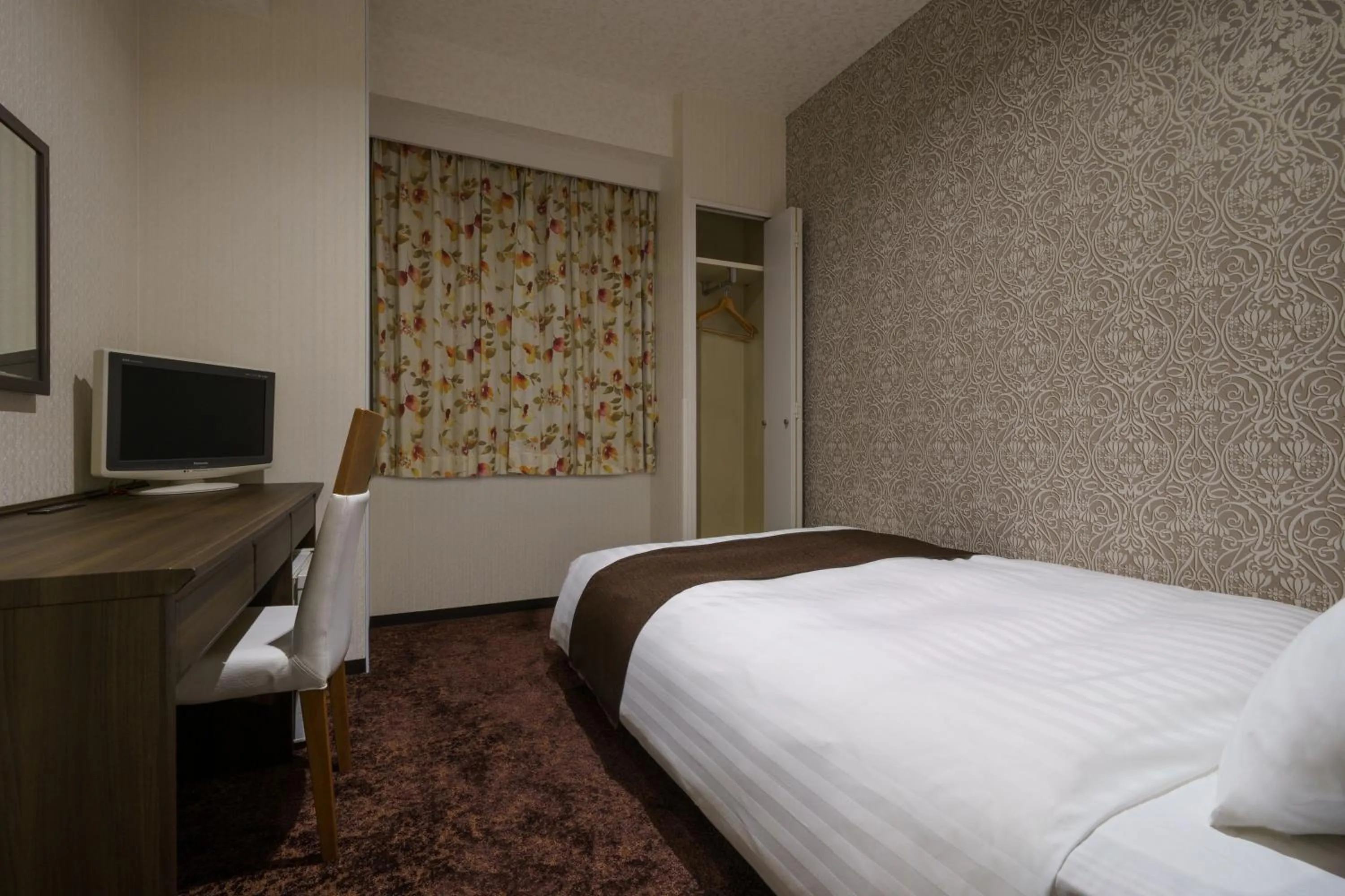 Bed in Hotel Centmain Nagoya