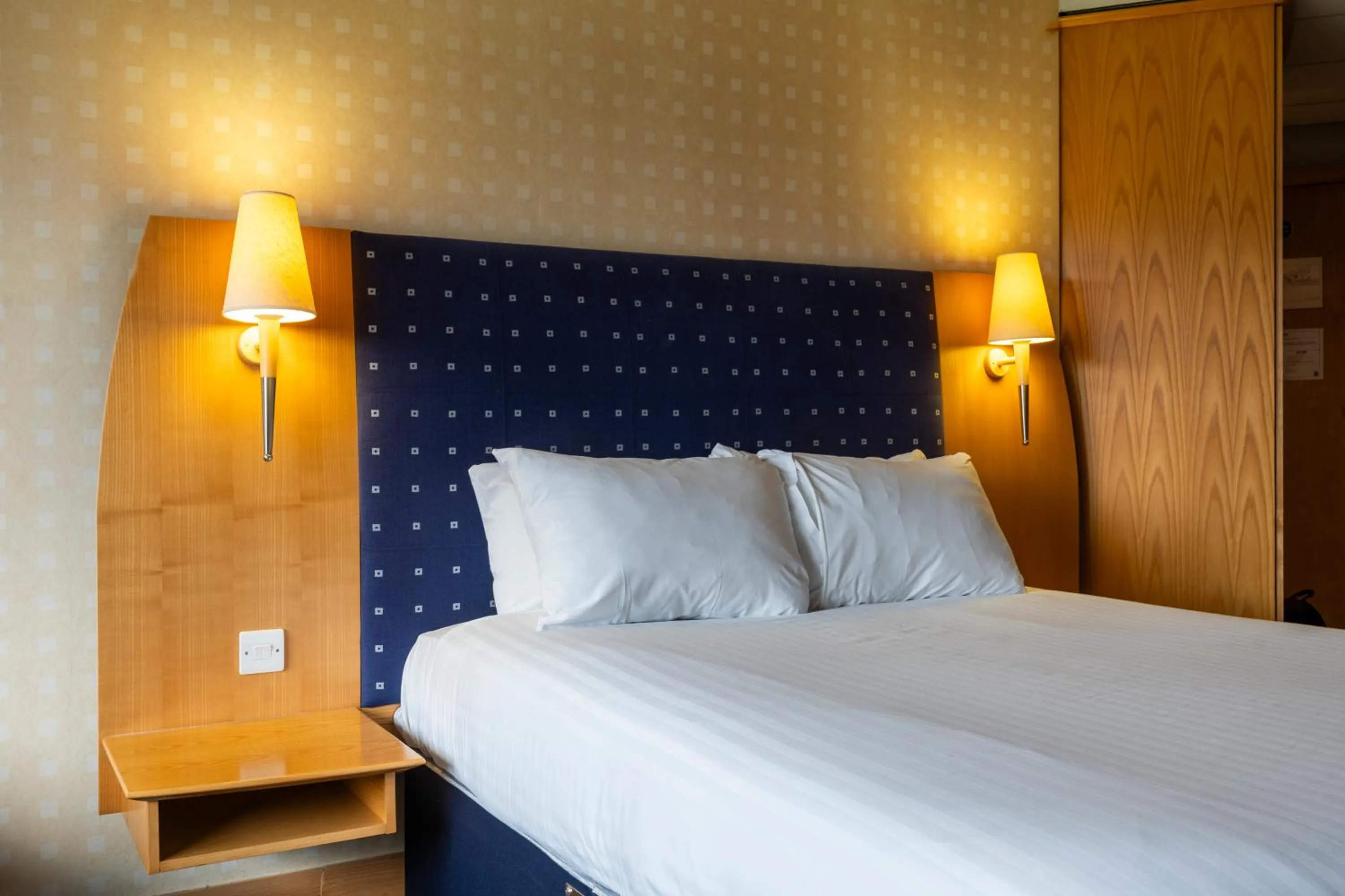 Bed in The Bolton Stadium Hotel, a member of Radisson Individuals