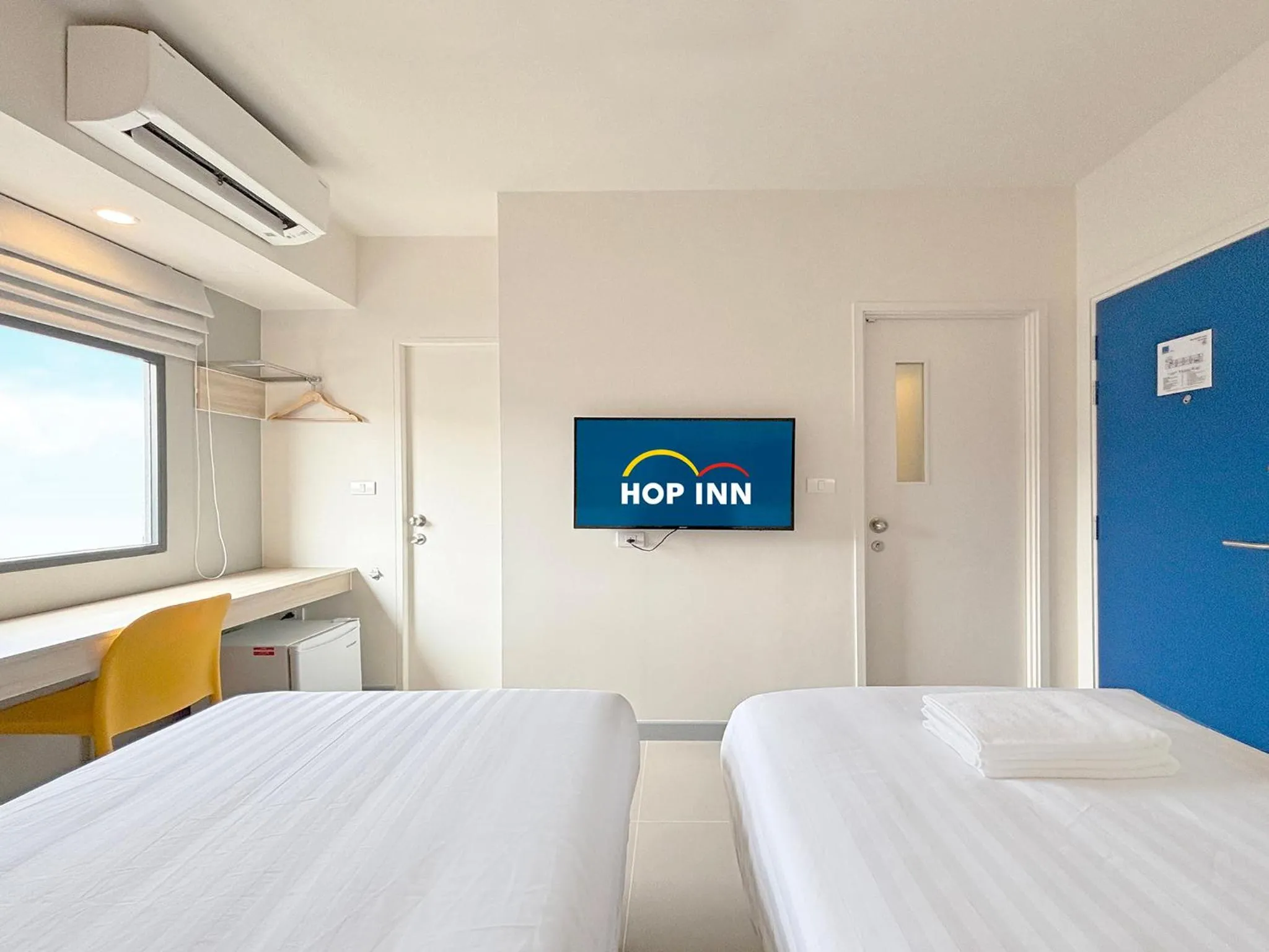 Bed in HOP INN Suphanburi