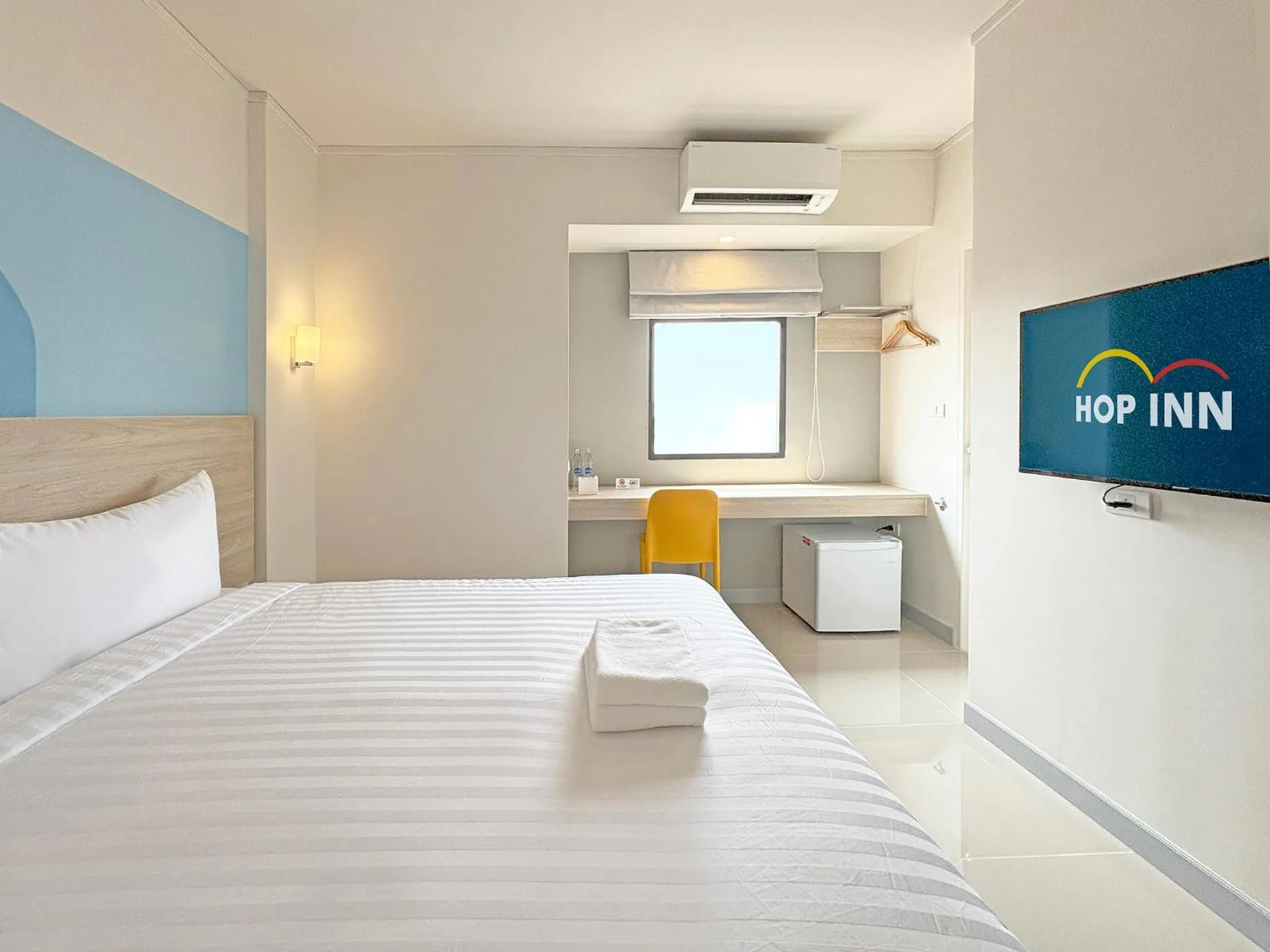 Bed in HOP INN Suphanburi