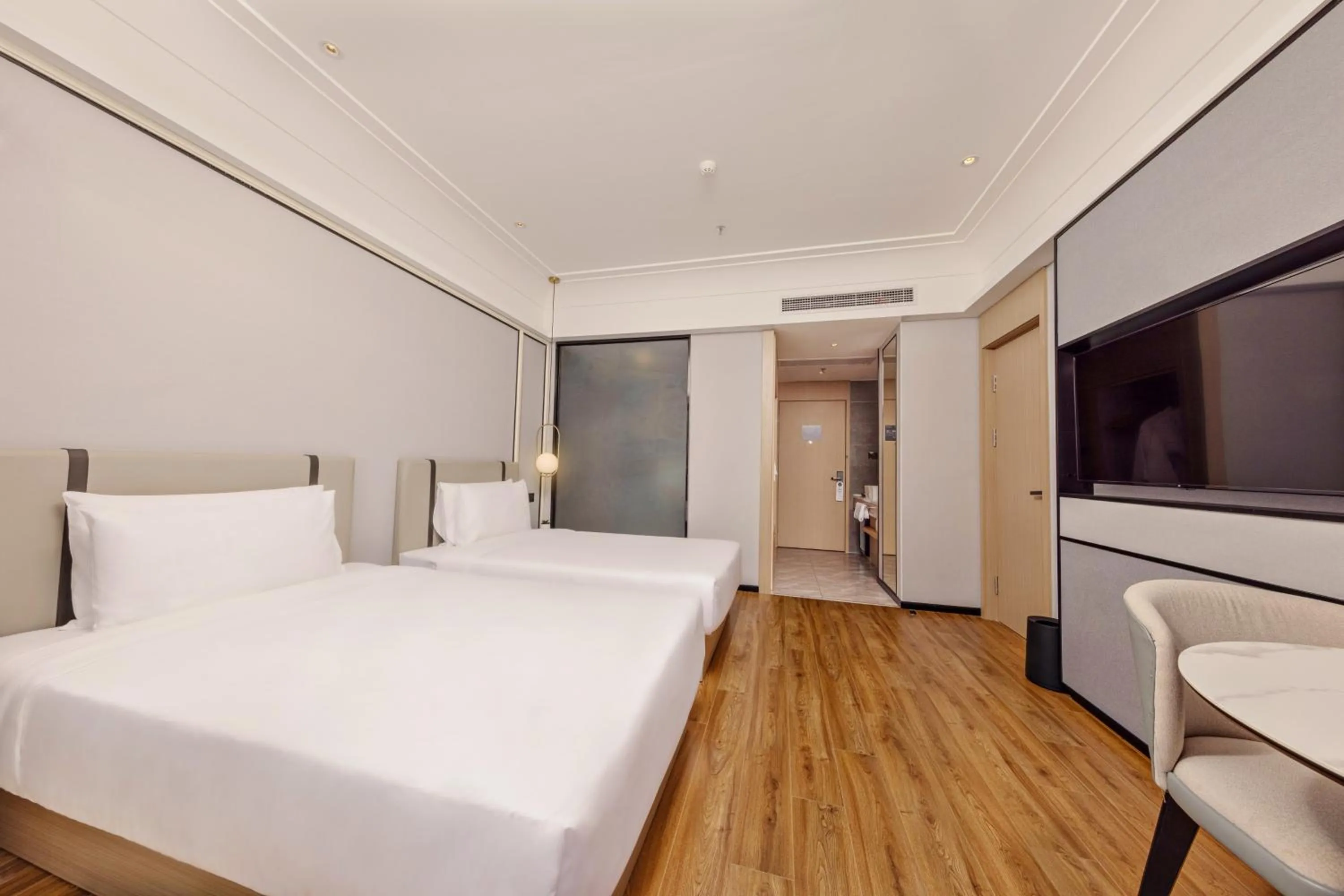 Bed in Marco Polo Hotel