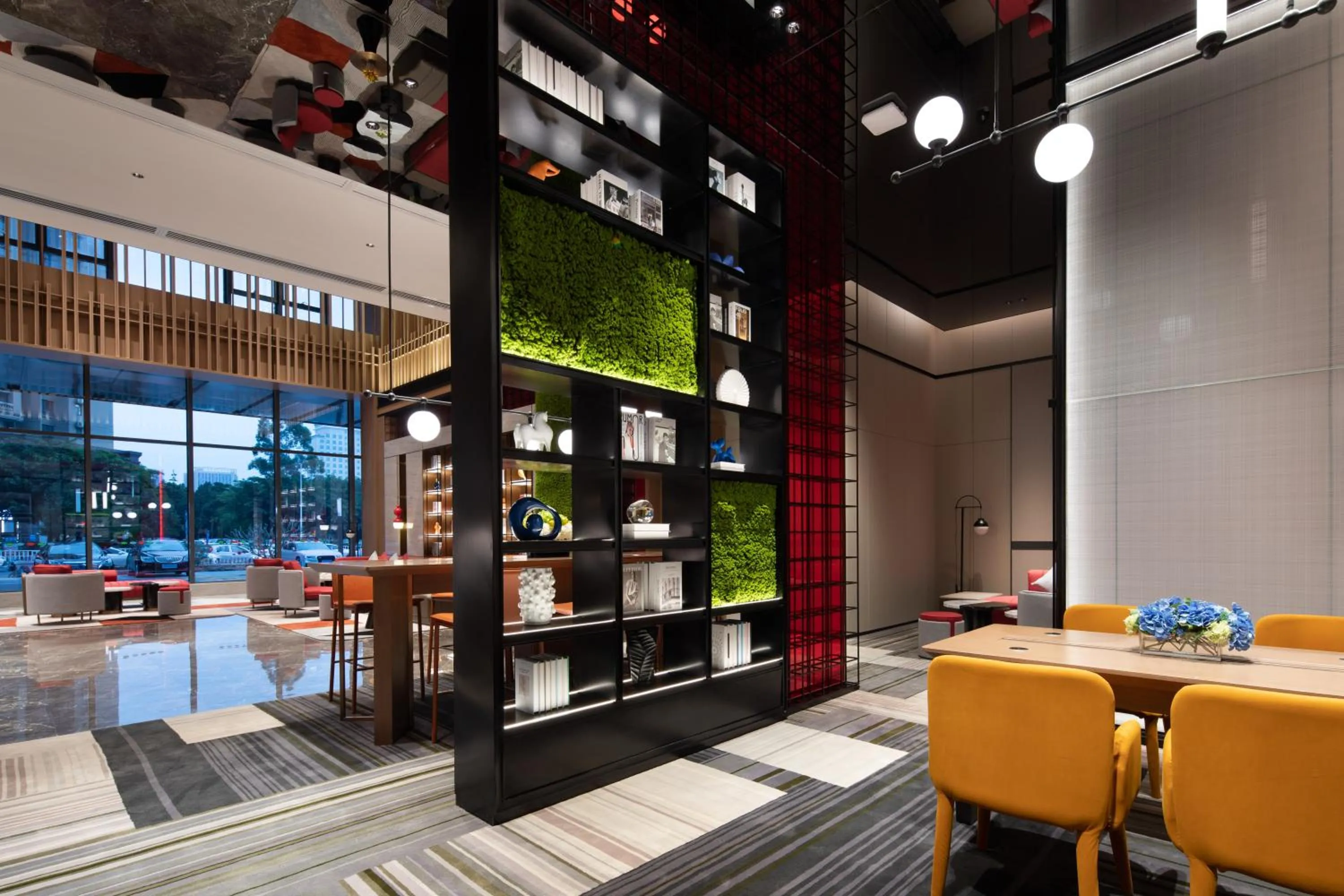 Communal lounge/ TV room in Hampton by Hilton Guigang