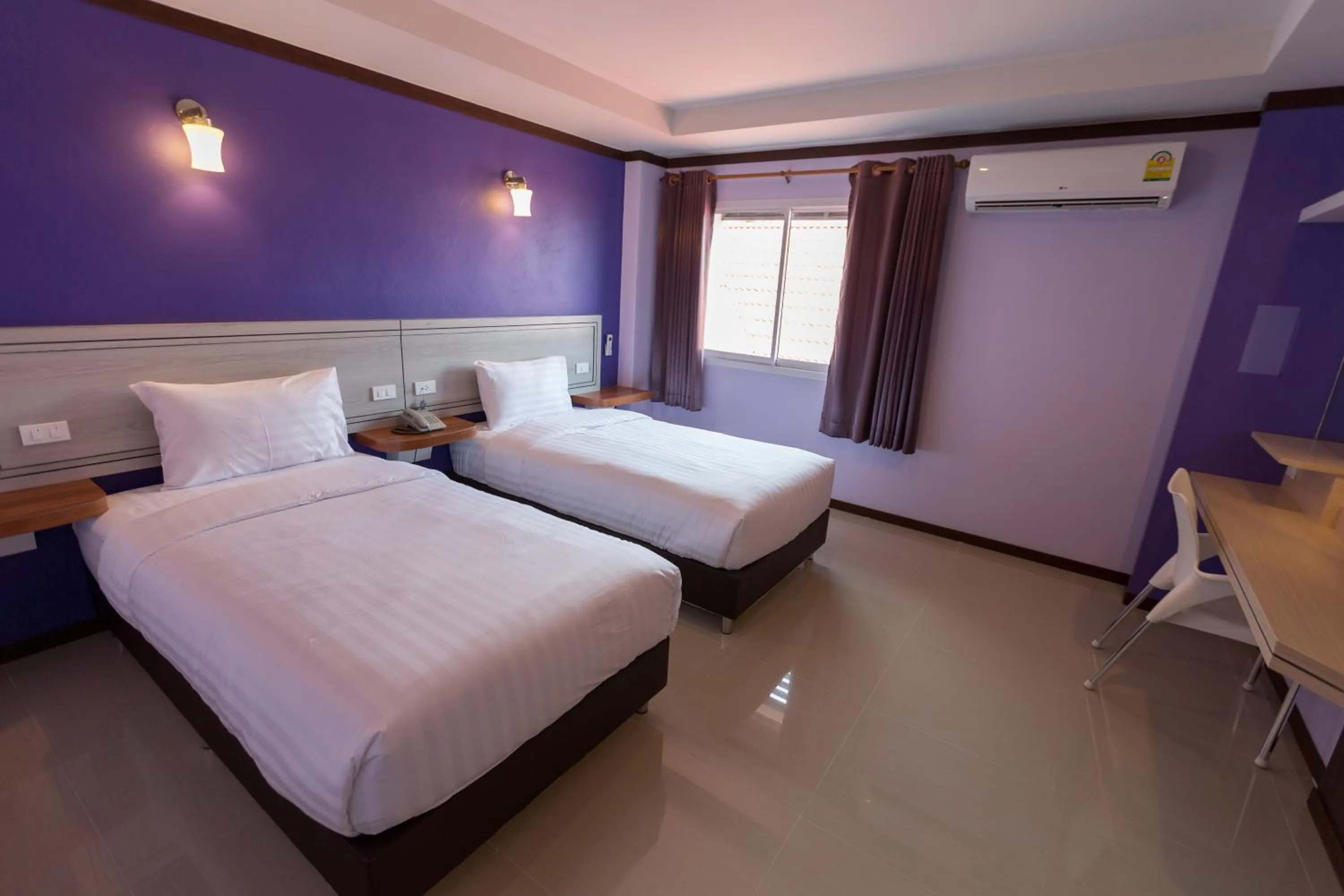 Bed in Thungtawan Hotel