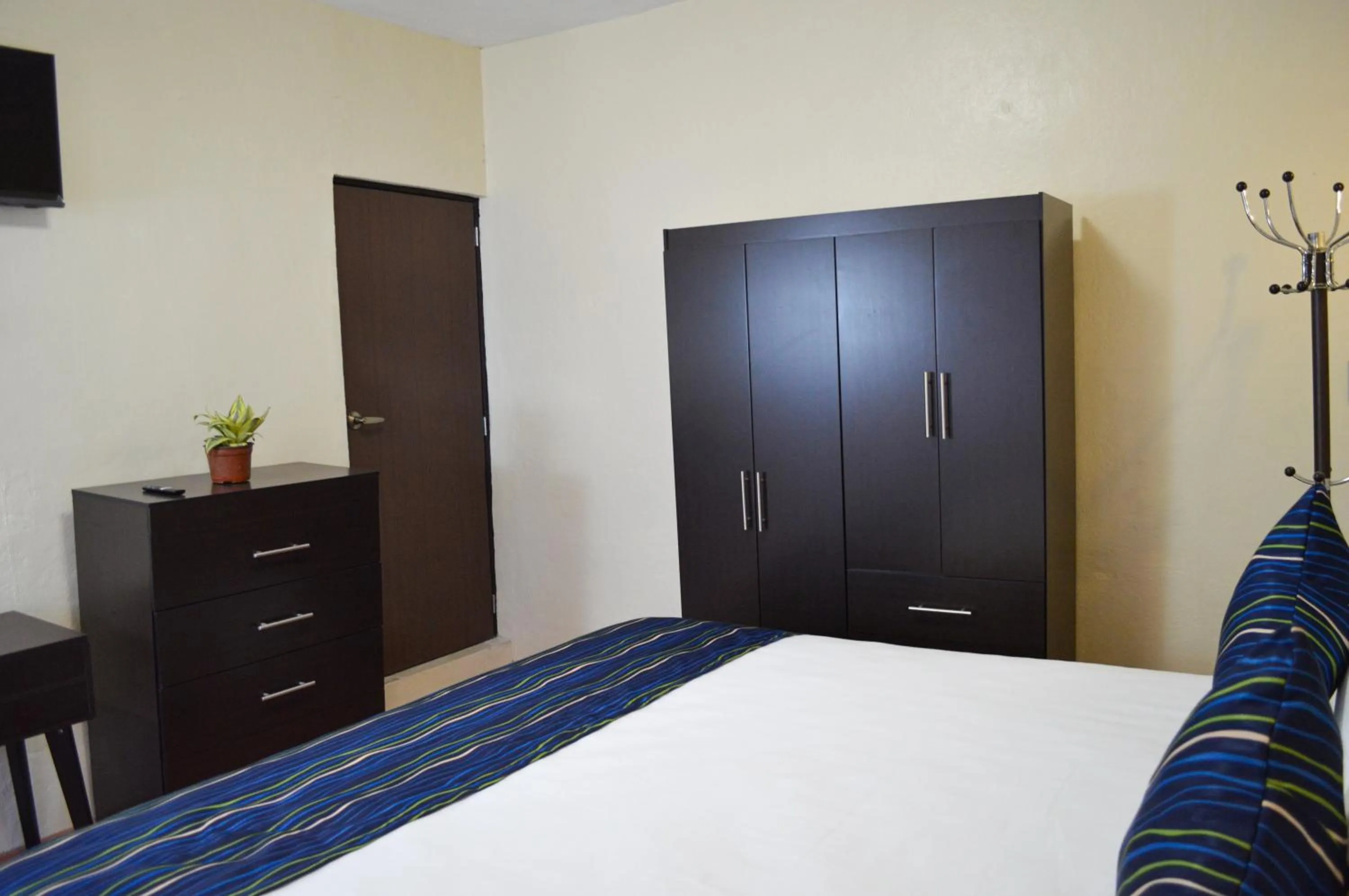 Bedroom in Capital O Casa Rotter