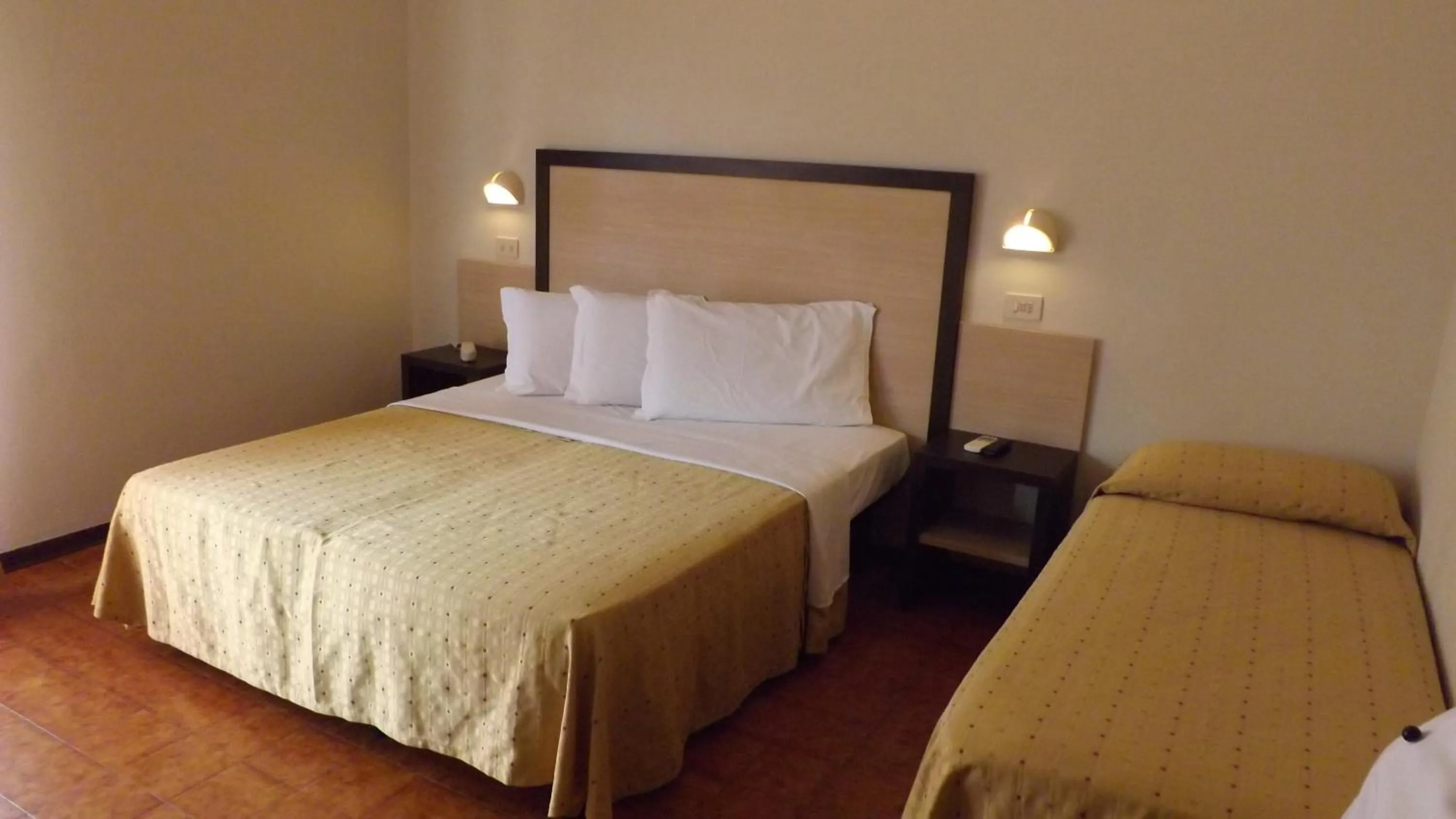 Bed in Miomar Beach Hotel