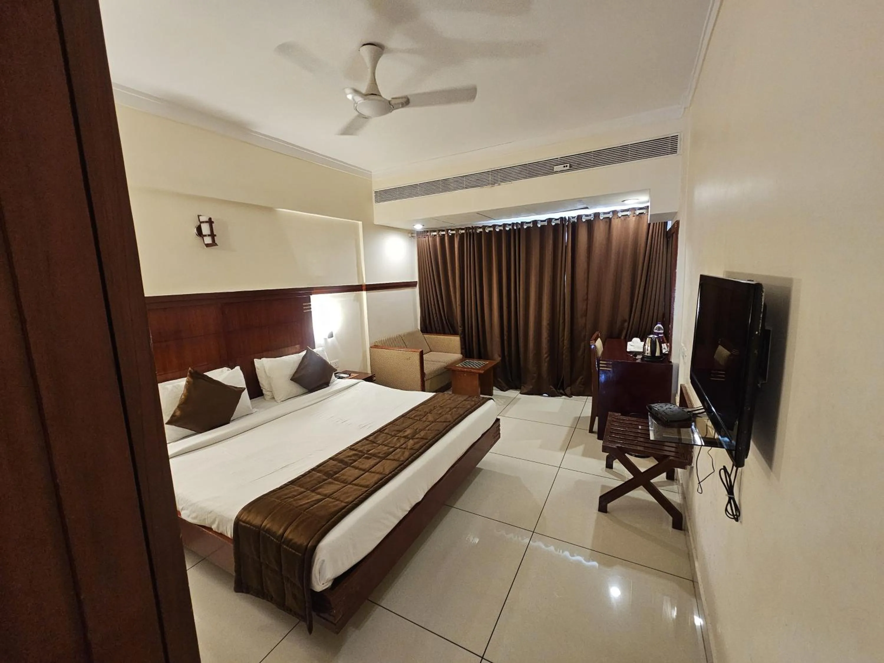 Bed in KTDC Rain Drops Hotel