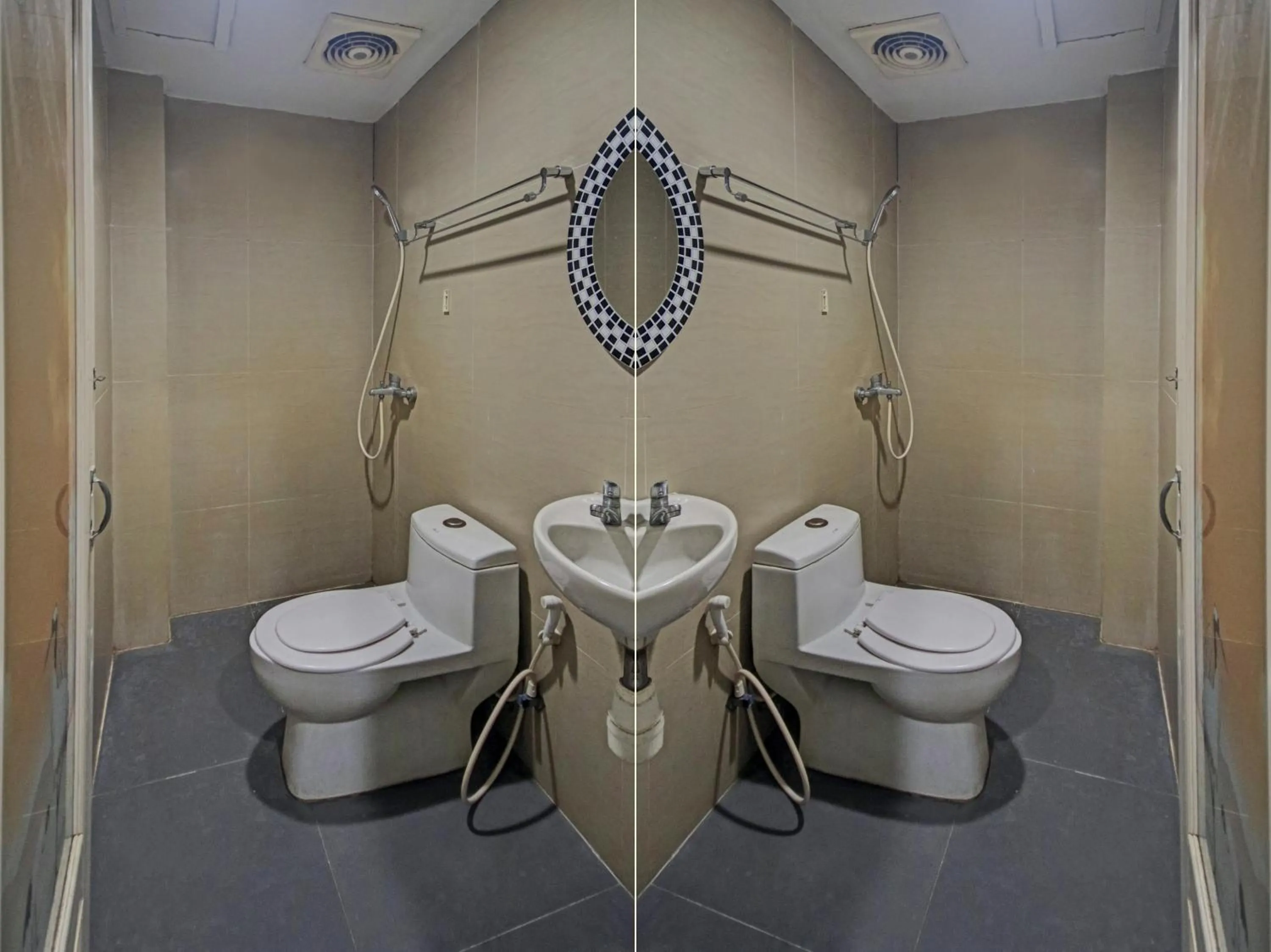 Bathroom in OYO 2574 Z Suites Hotel