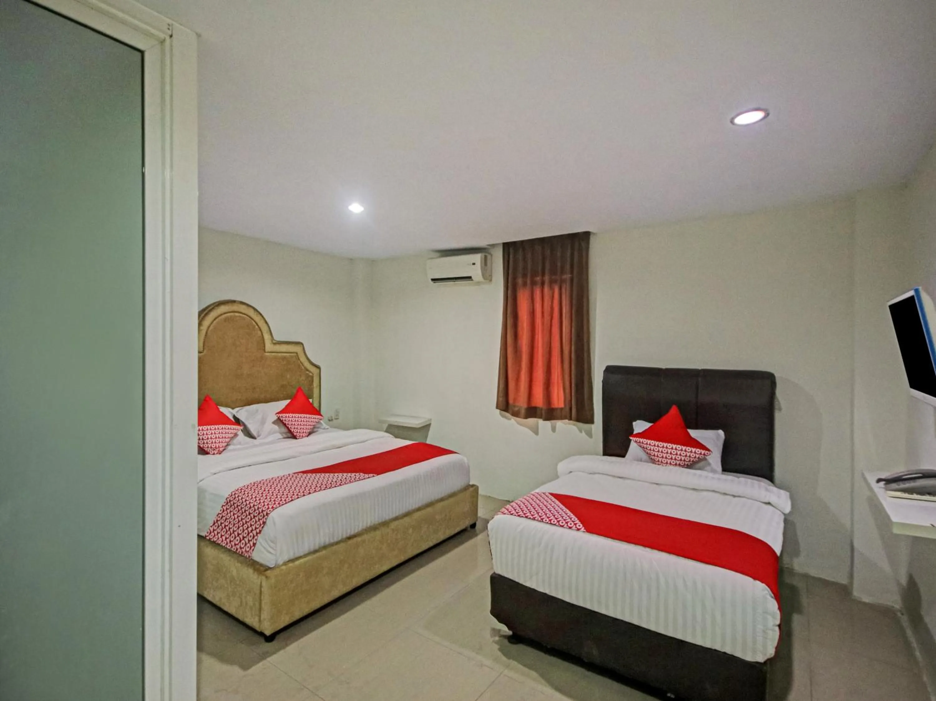 Bedroom in OYO 2574 Z Suites Hotel