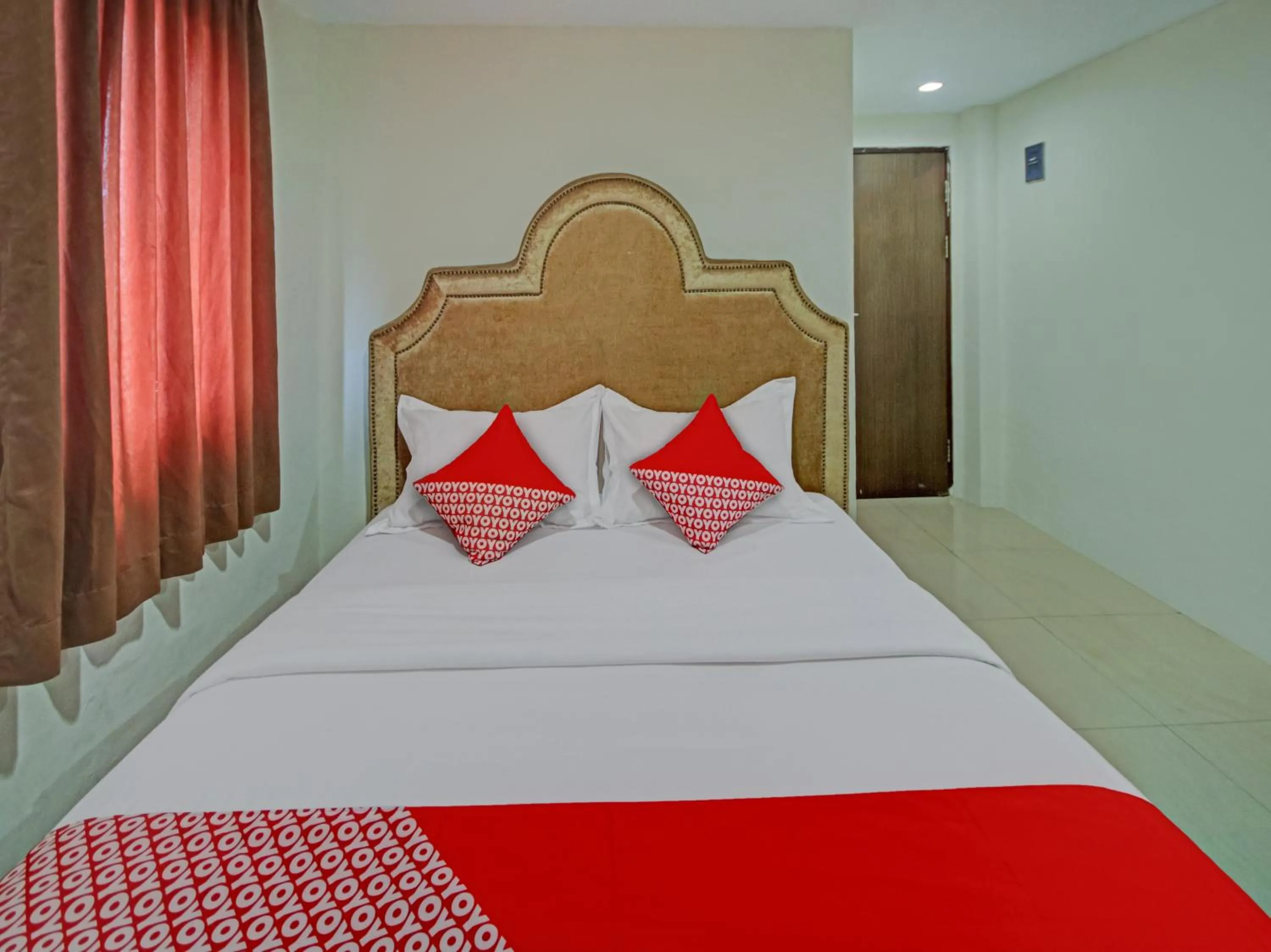 Bedroom in OYO 2574 Z Suites Hotel