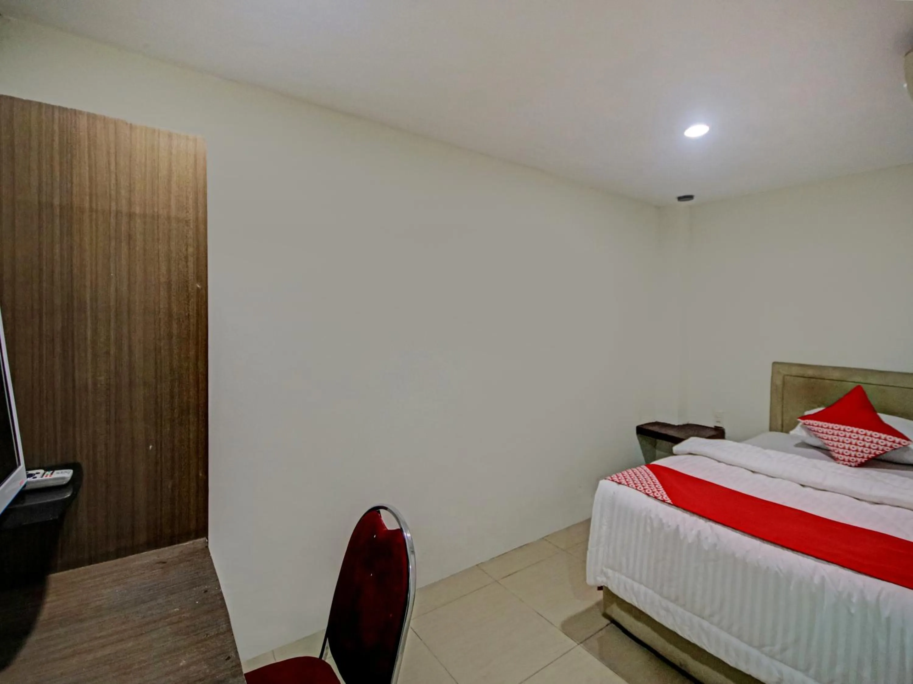 Bedroom in OYO 2574 Z Suites Hotel
