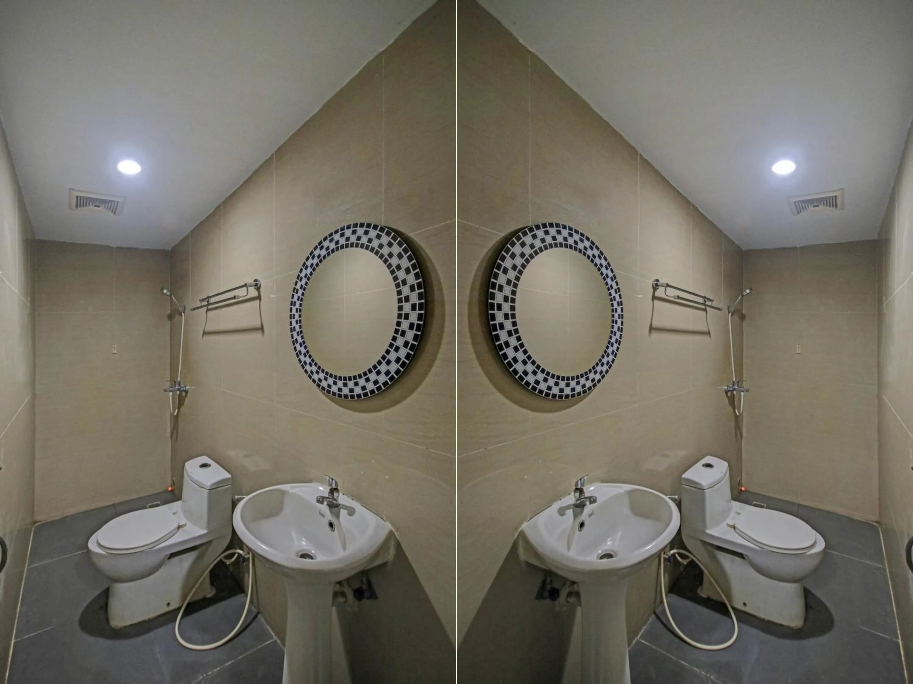 Bathroom in OYO 2574 Z Suites Hotel