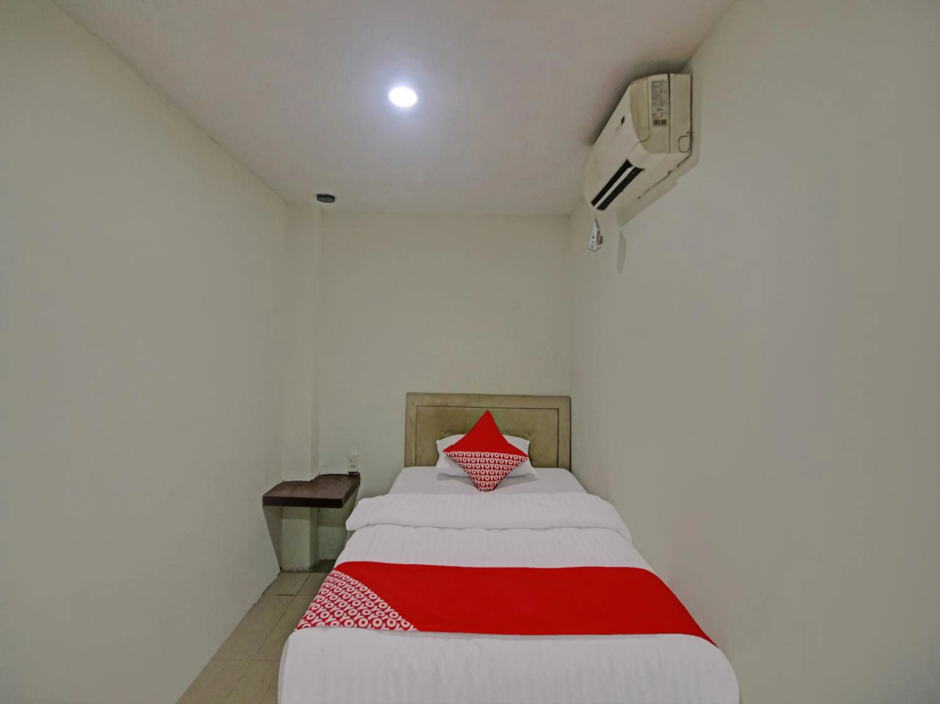 Bedroom in OYO 2574 Z Suites Hotel