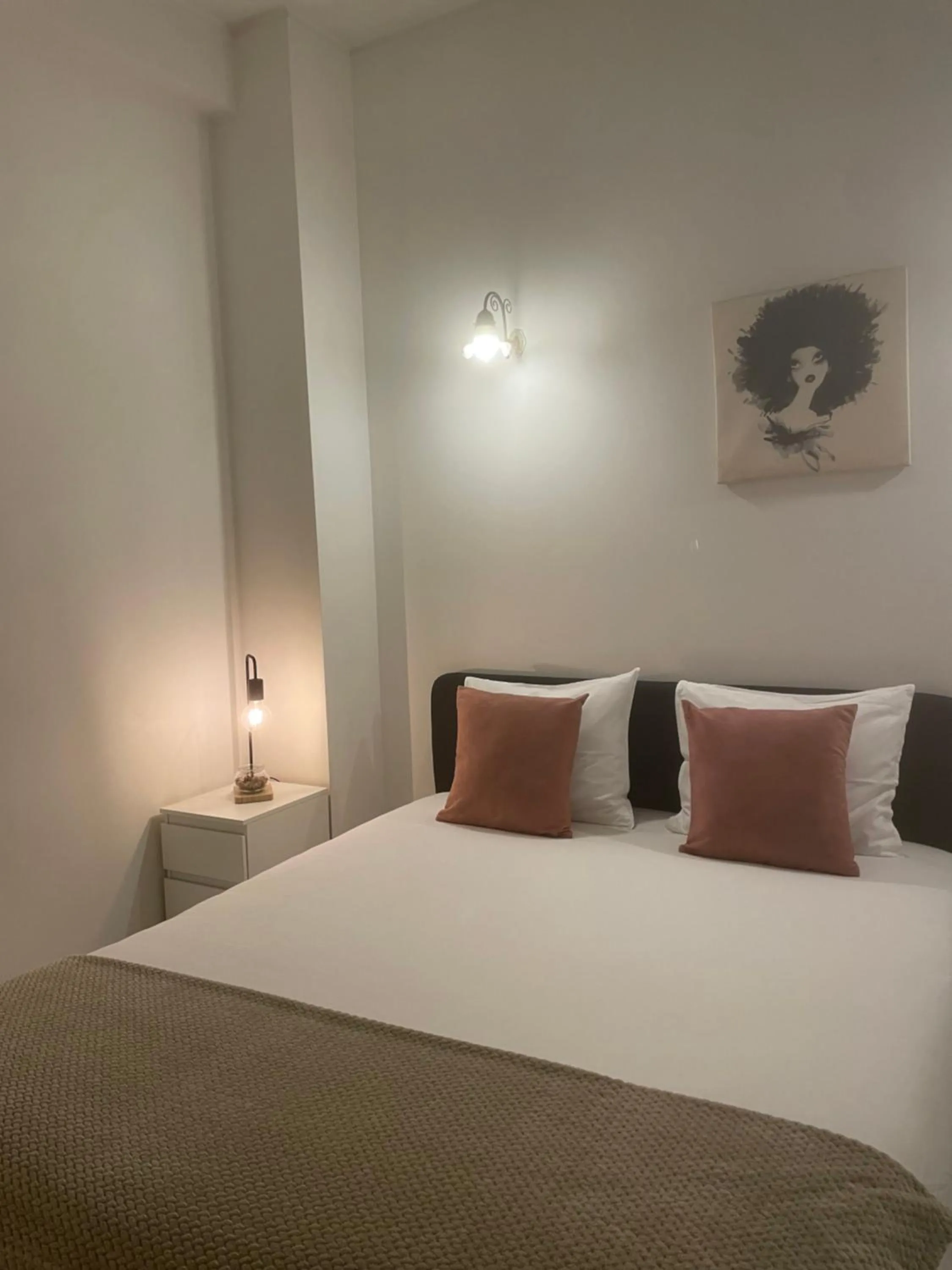 Bed in Miguel Bombarda Cozy Apartment