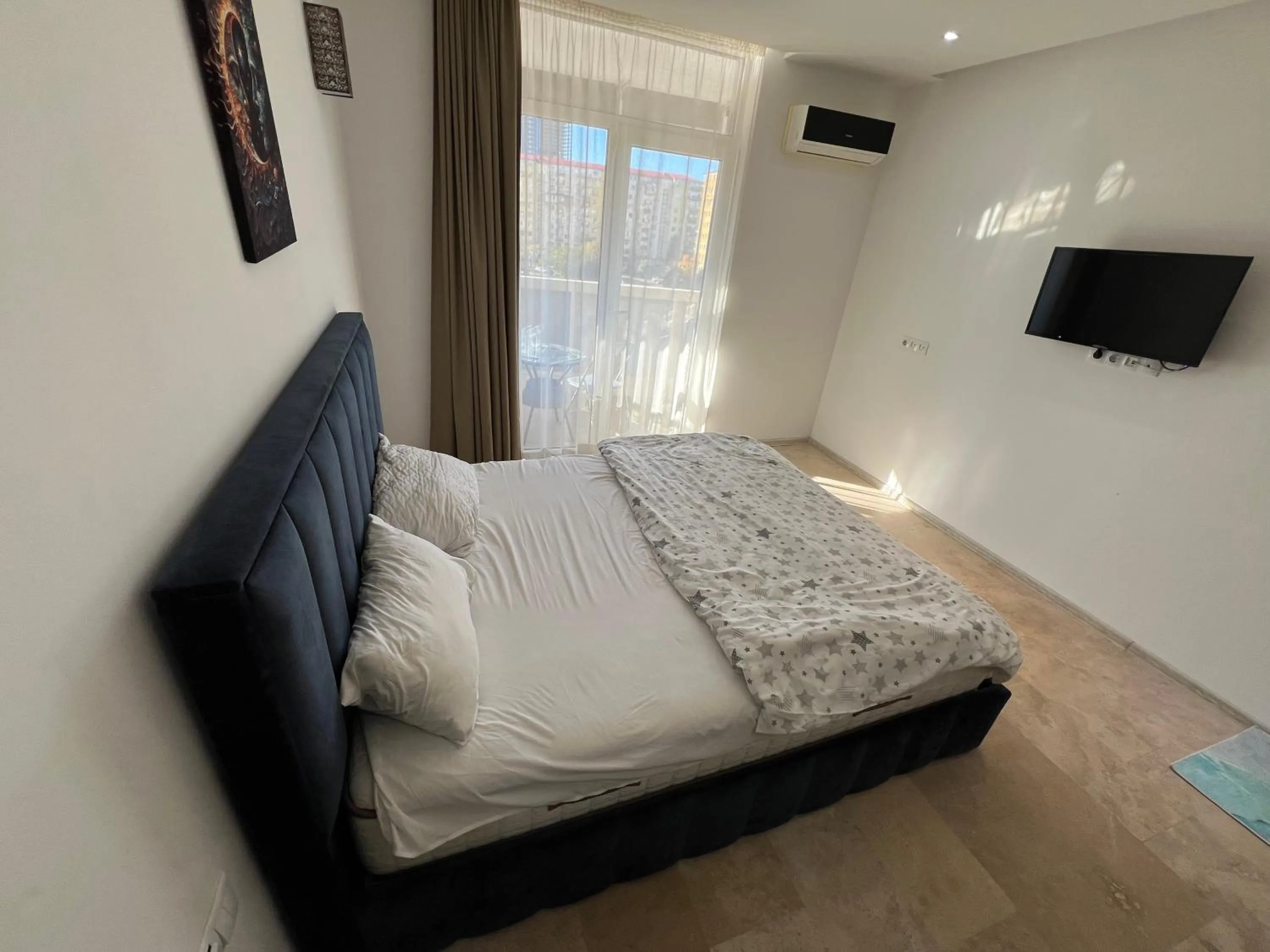 Communal lounge/ TV room, Bed in ORBI Residence LUXURY