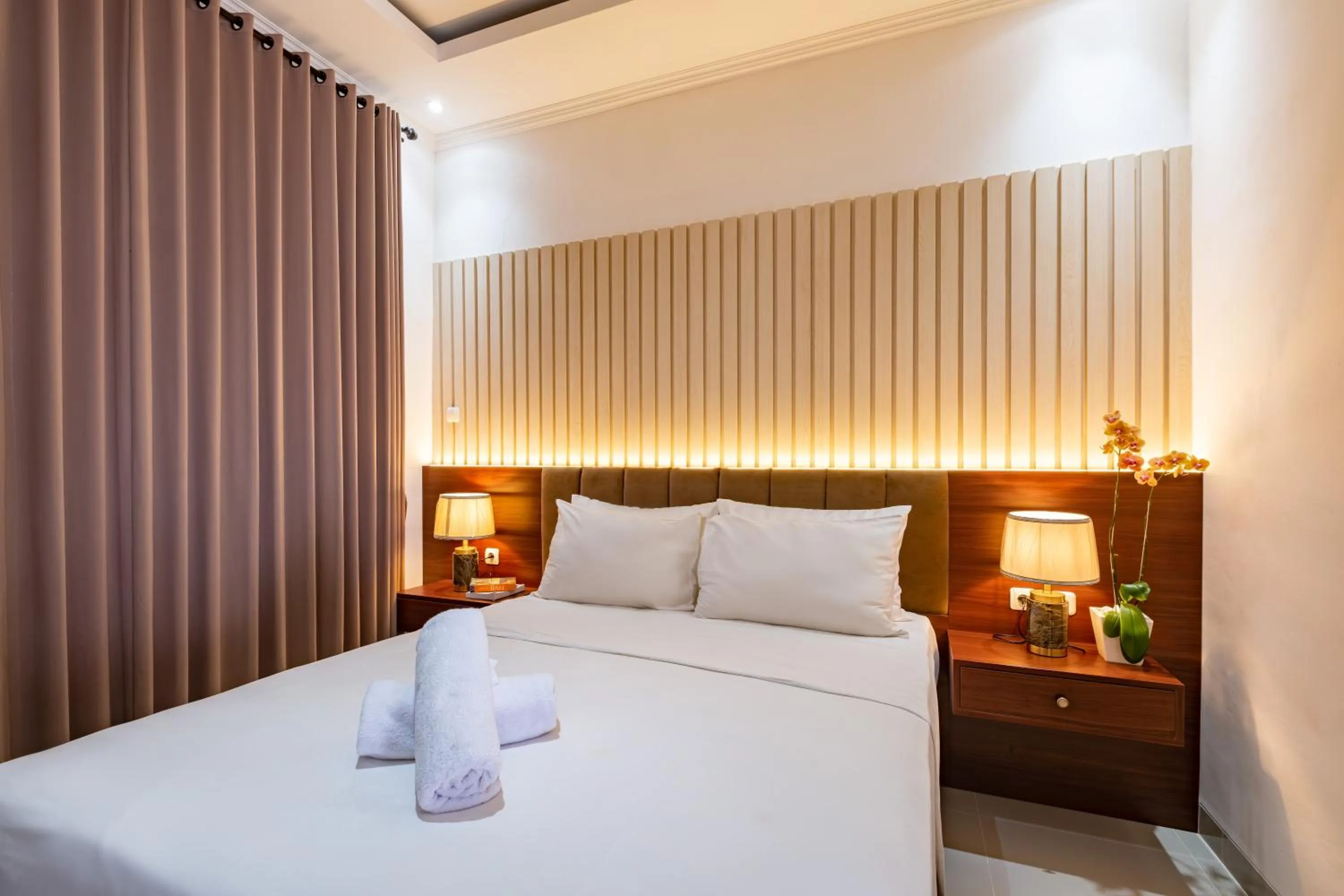 Bed in Taman Seminyak Suites