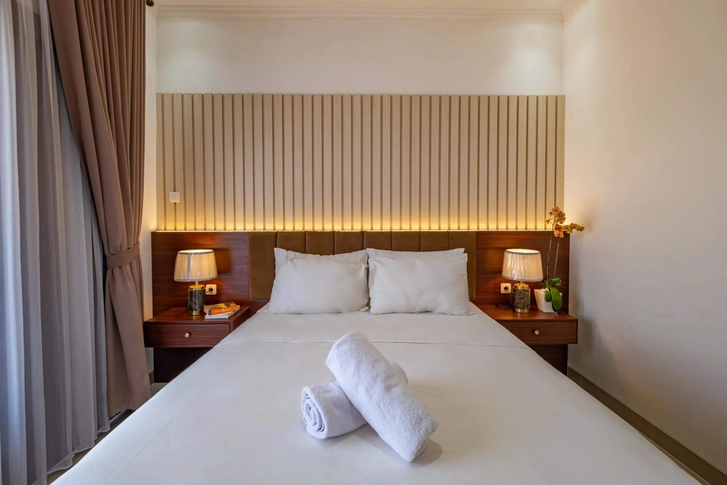Bed in Taman Seminyak Suites
