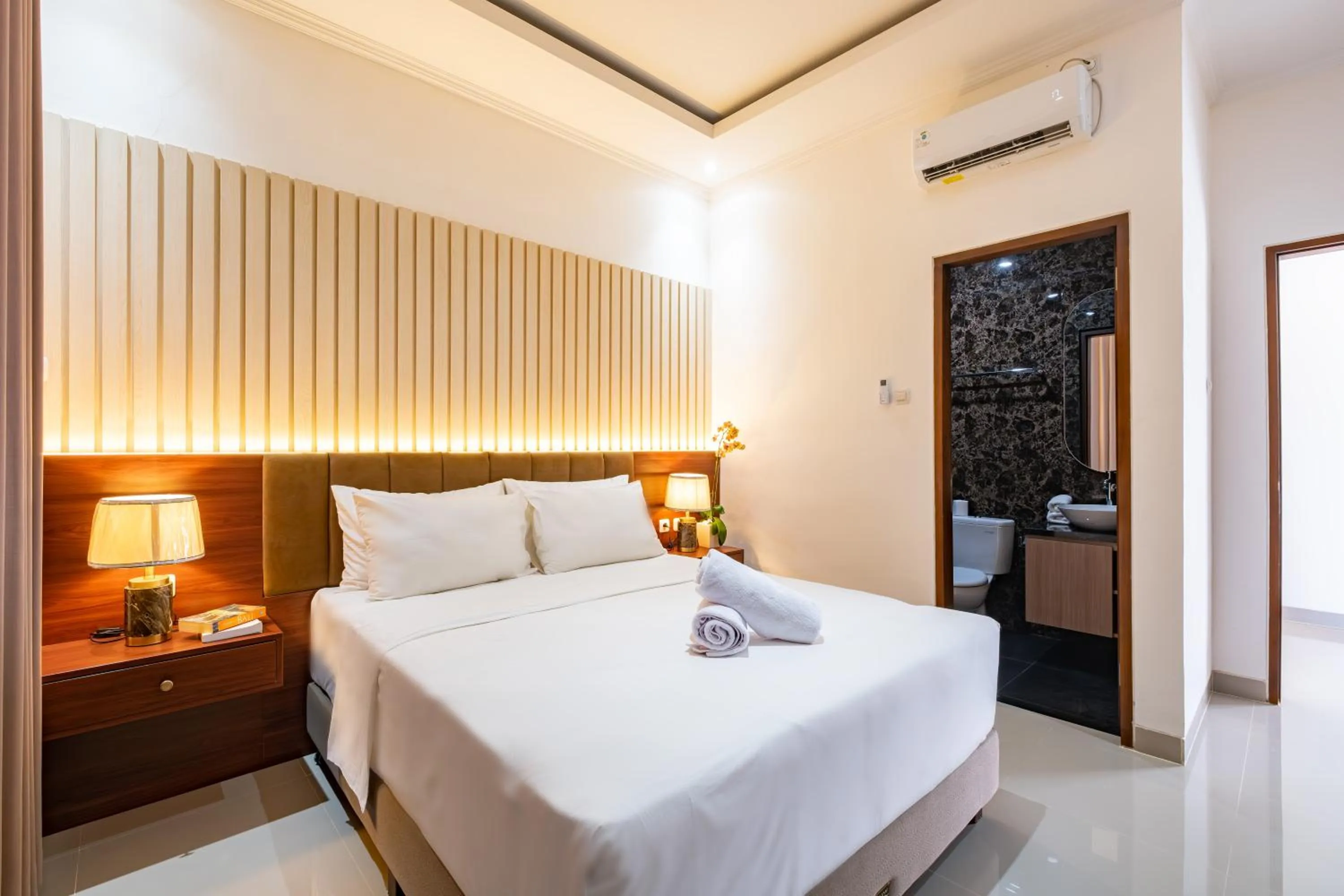 Bed in Taman Seminyak Suites