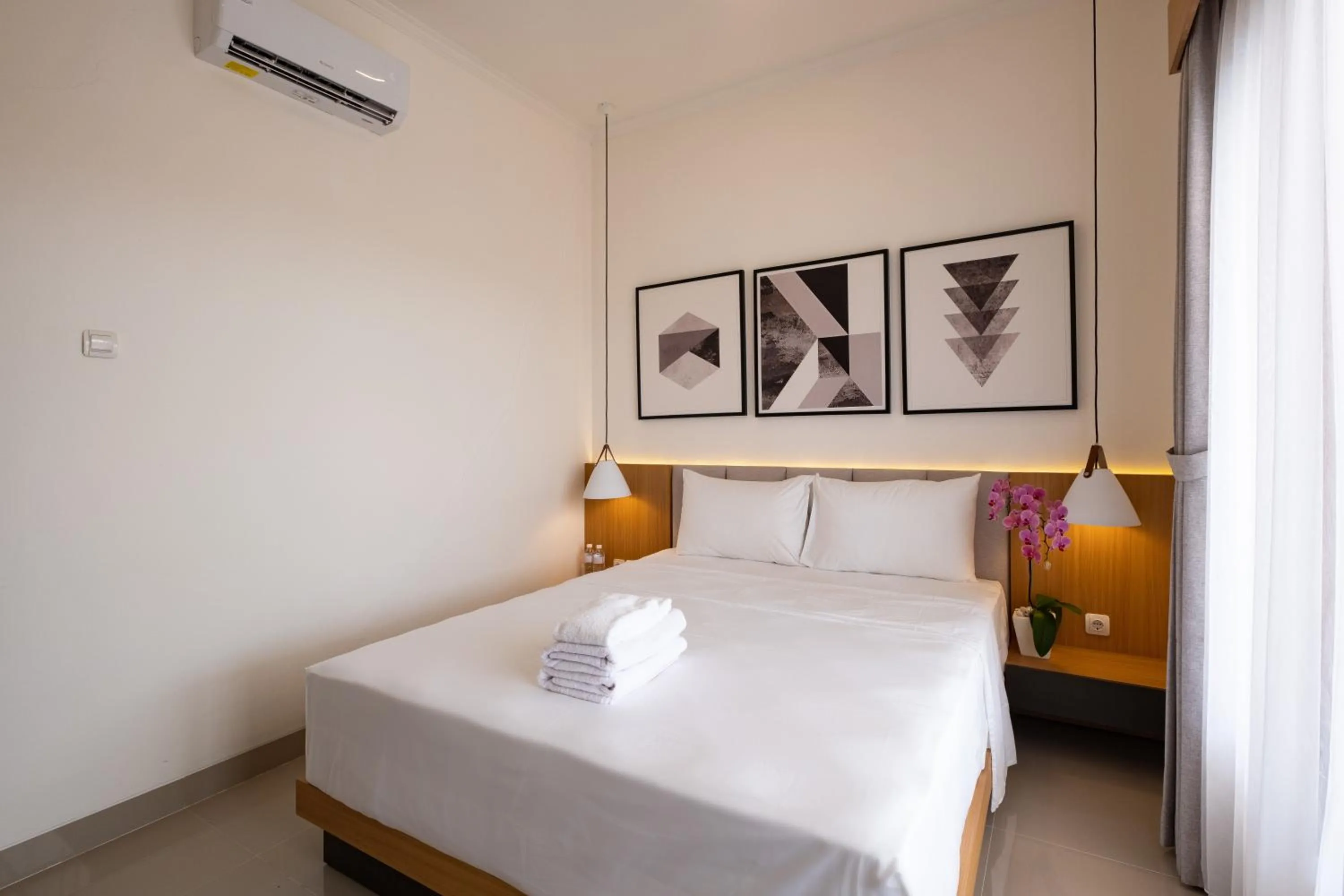 Bed in Taman Seminyak Suites