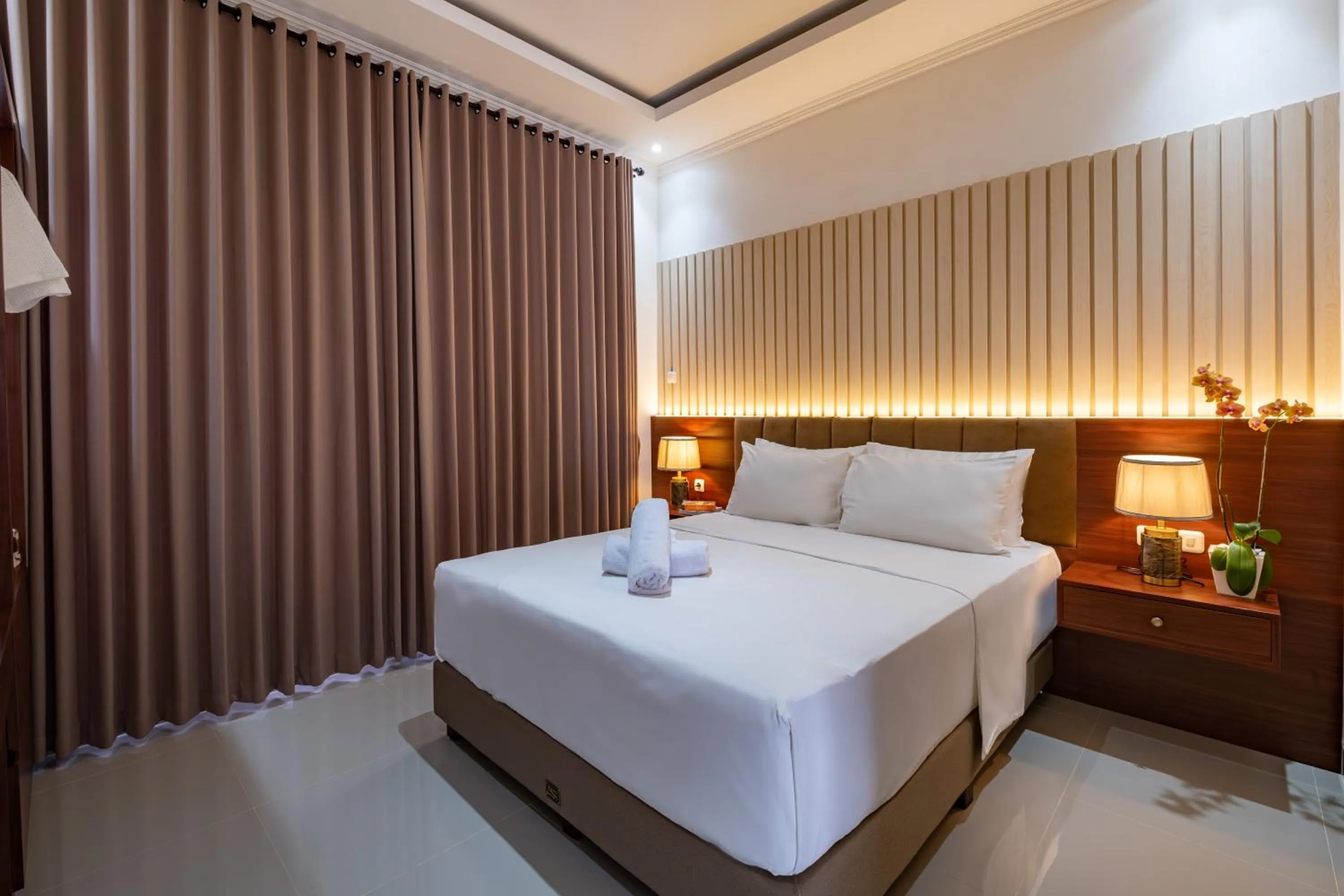 Bed in Taman Seminyak Suites