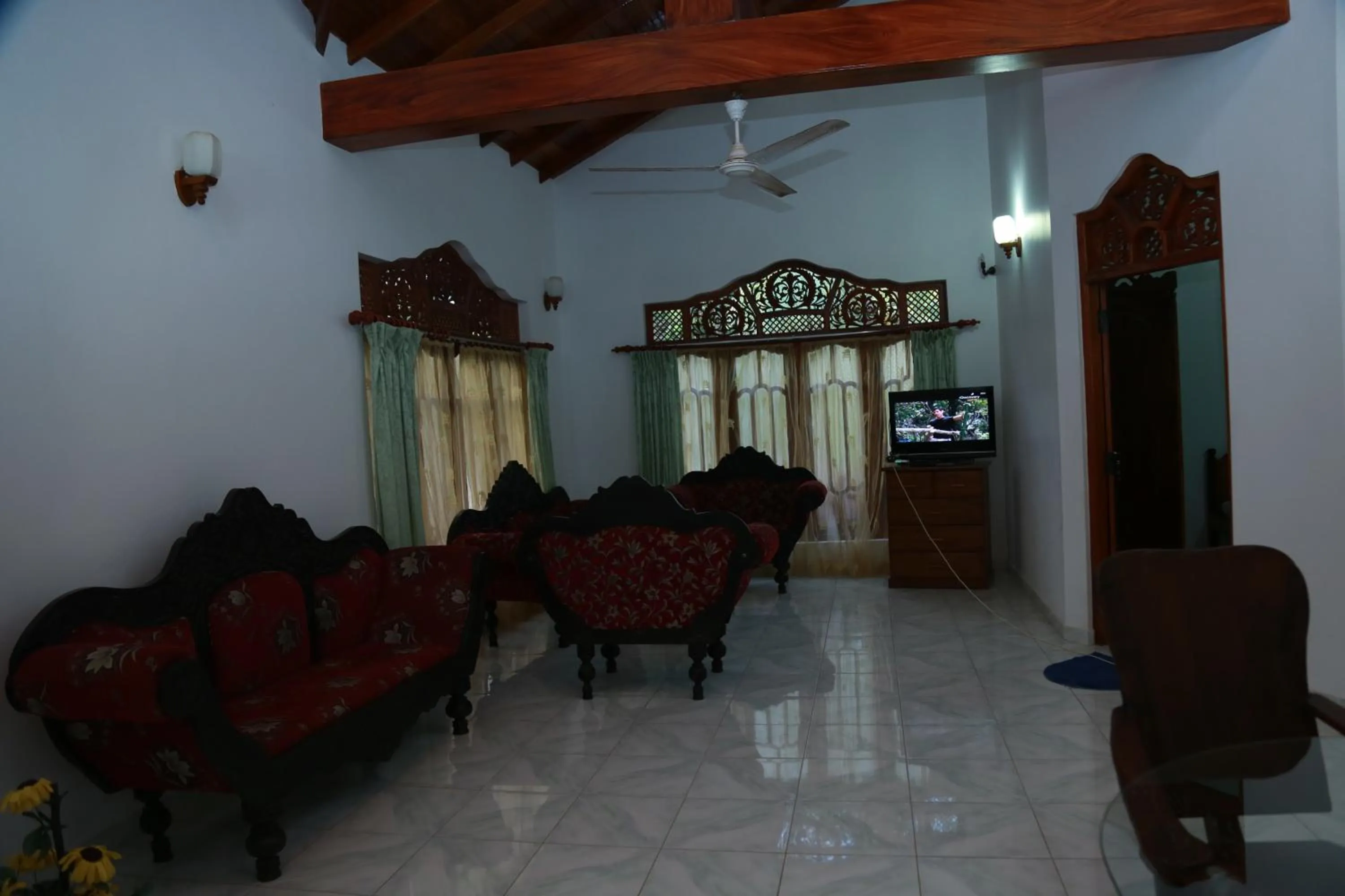 Communal lounge/ TV room in Sumal Villa