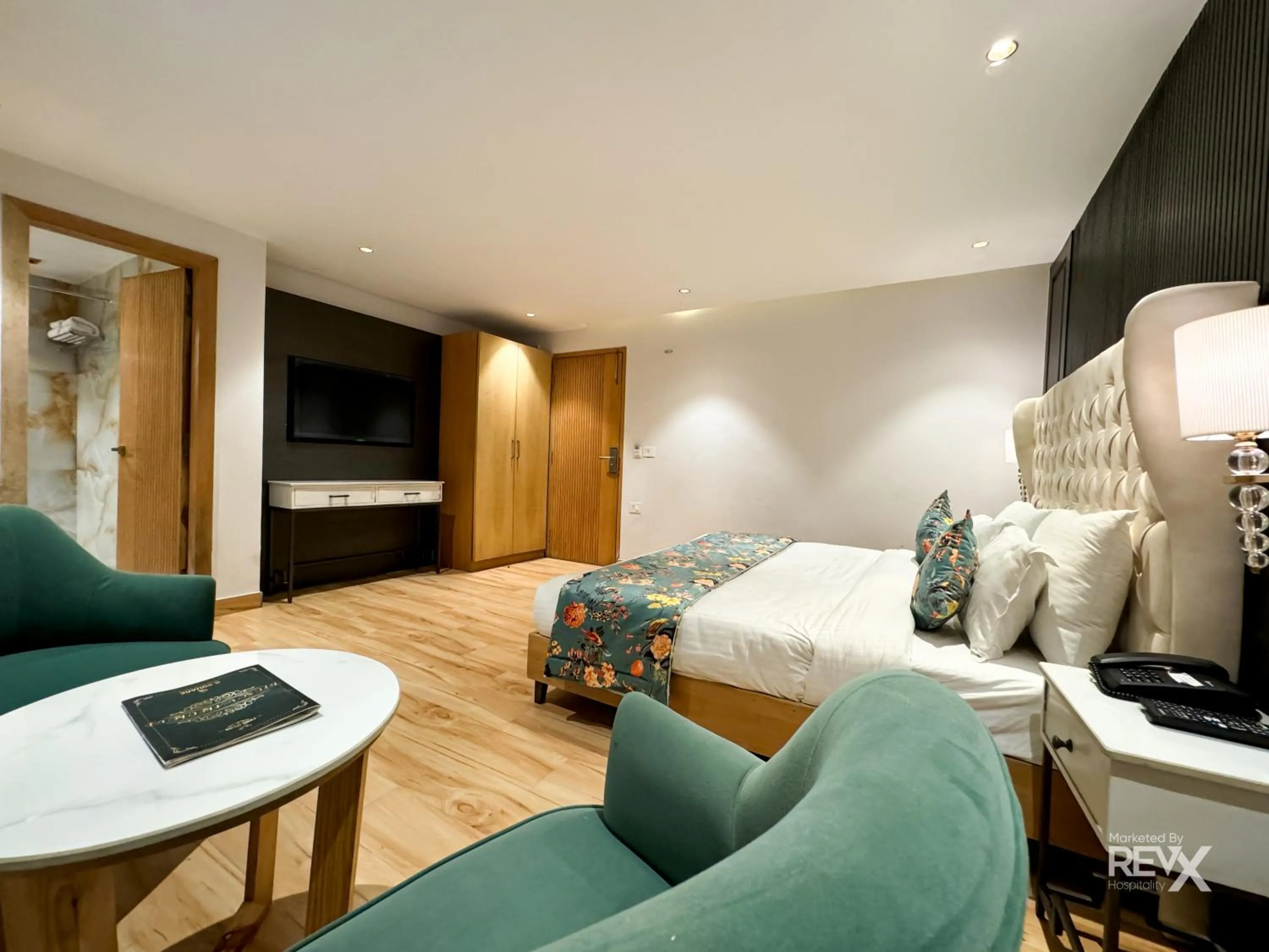 View (from property/room), Bed in Hotel Rockland Residency