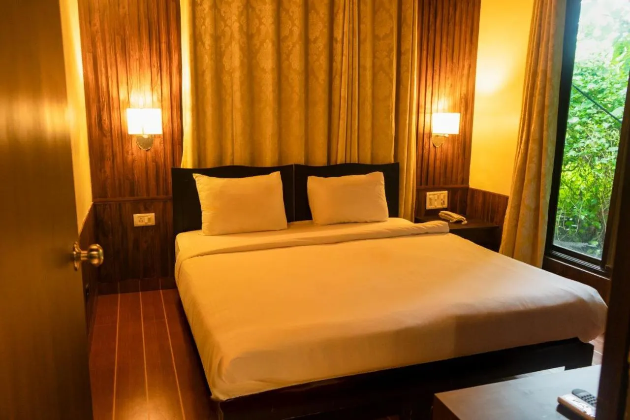 Bed in Silvanus Forest Retreat, Alibaug