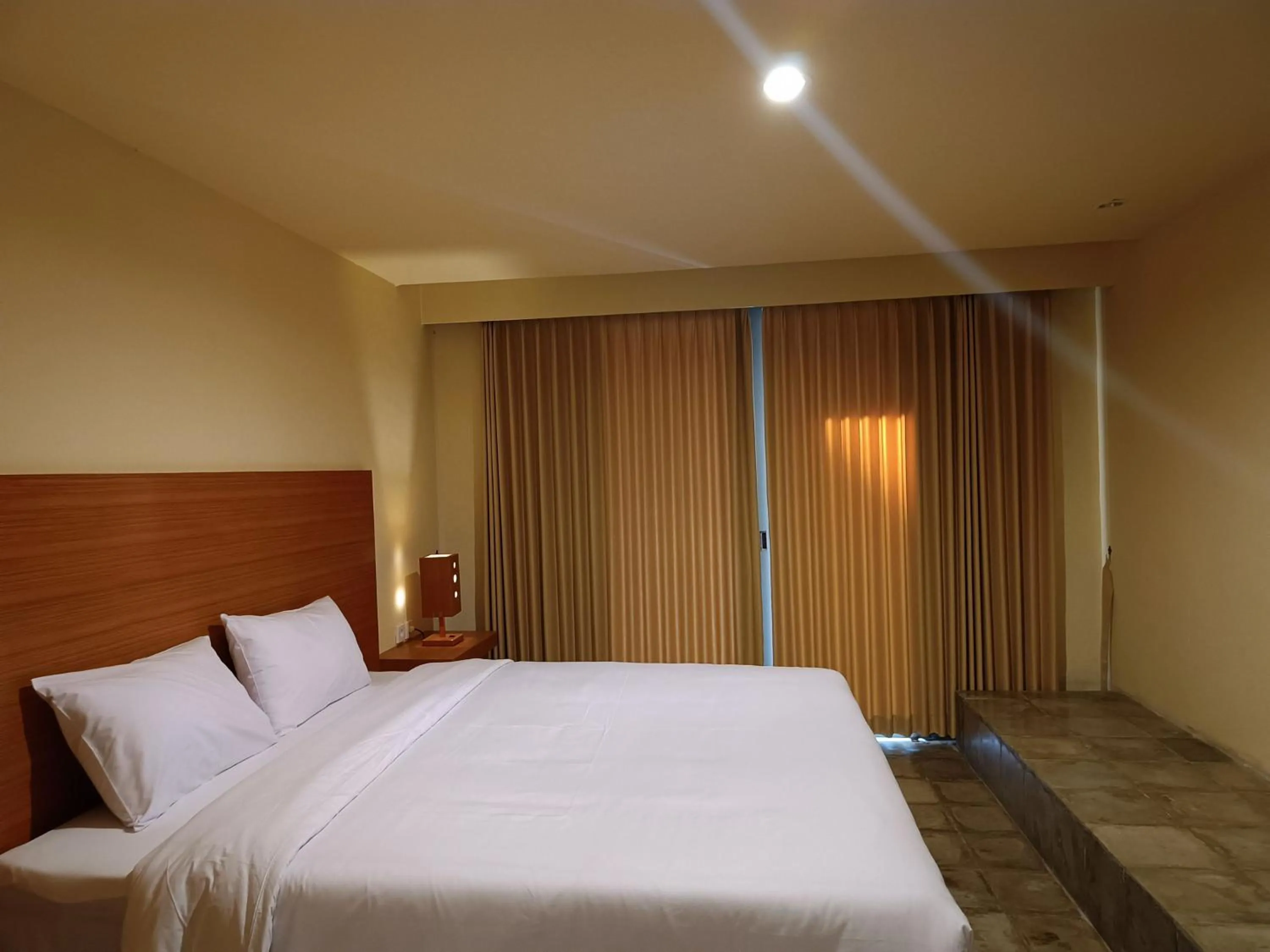 Bed in Kuta Living by Kamara