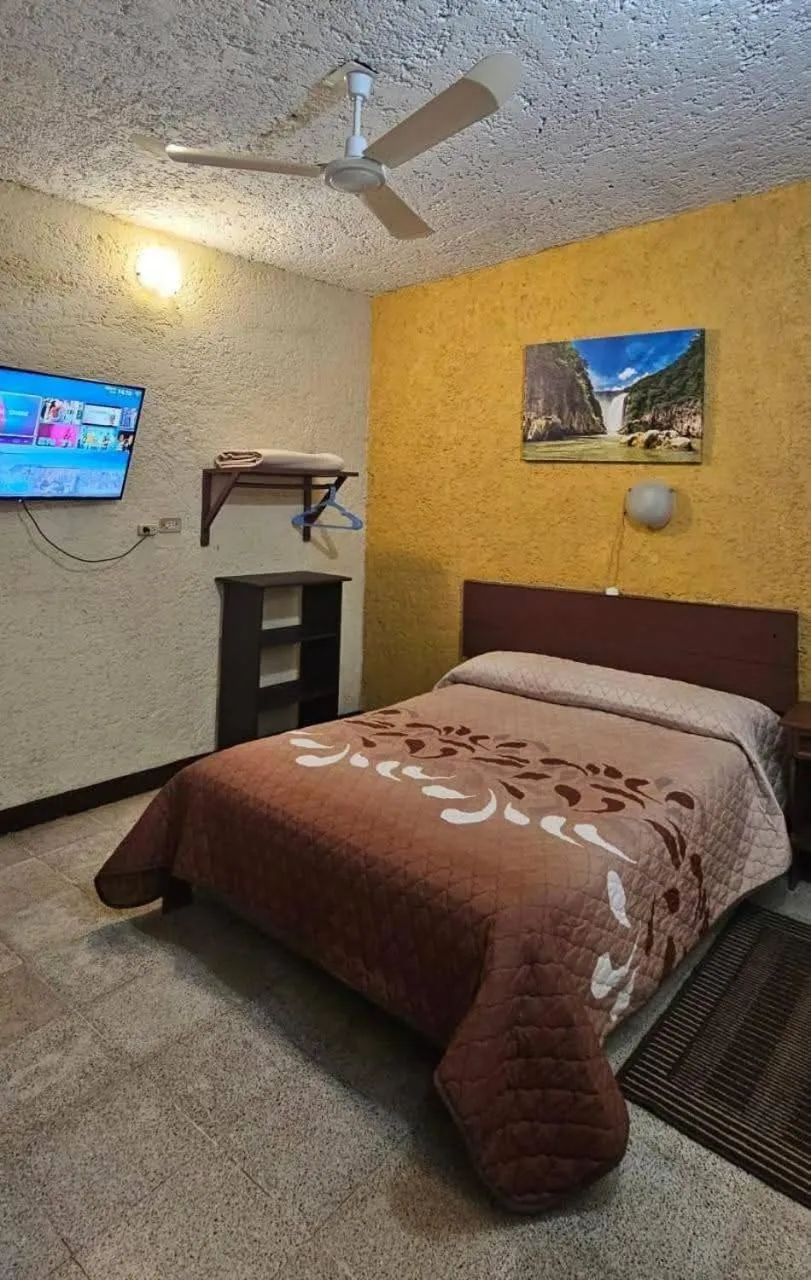 Bed in Hotel Riviera