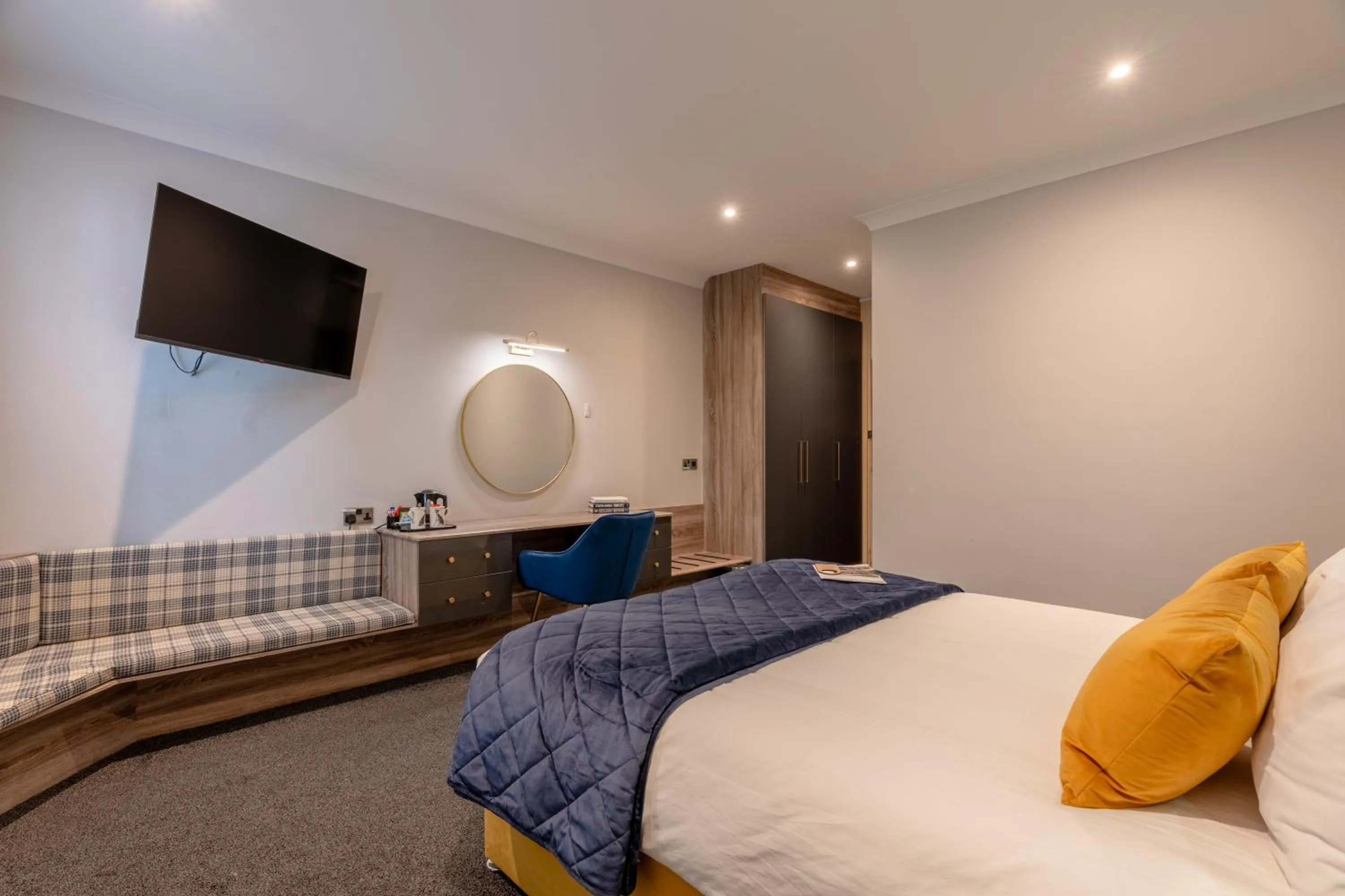 Bed in The Whitehall Hotel & Distillery