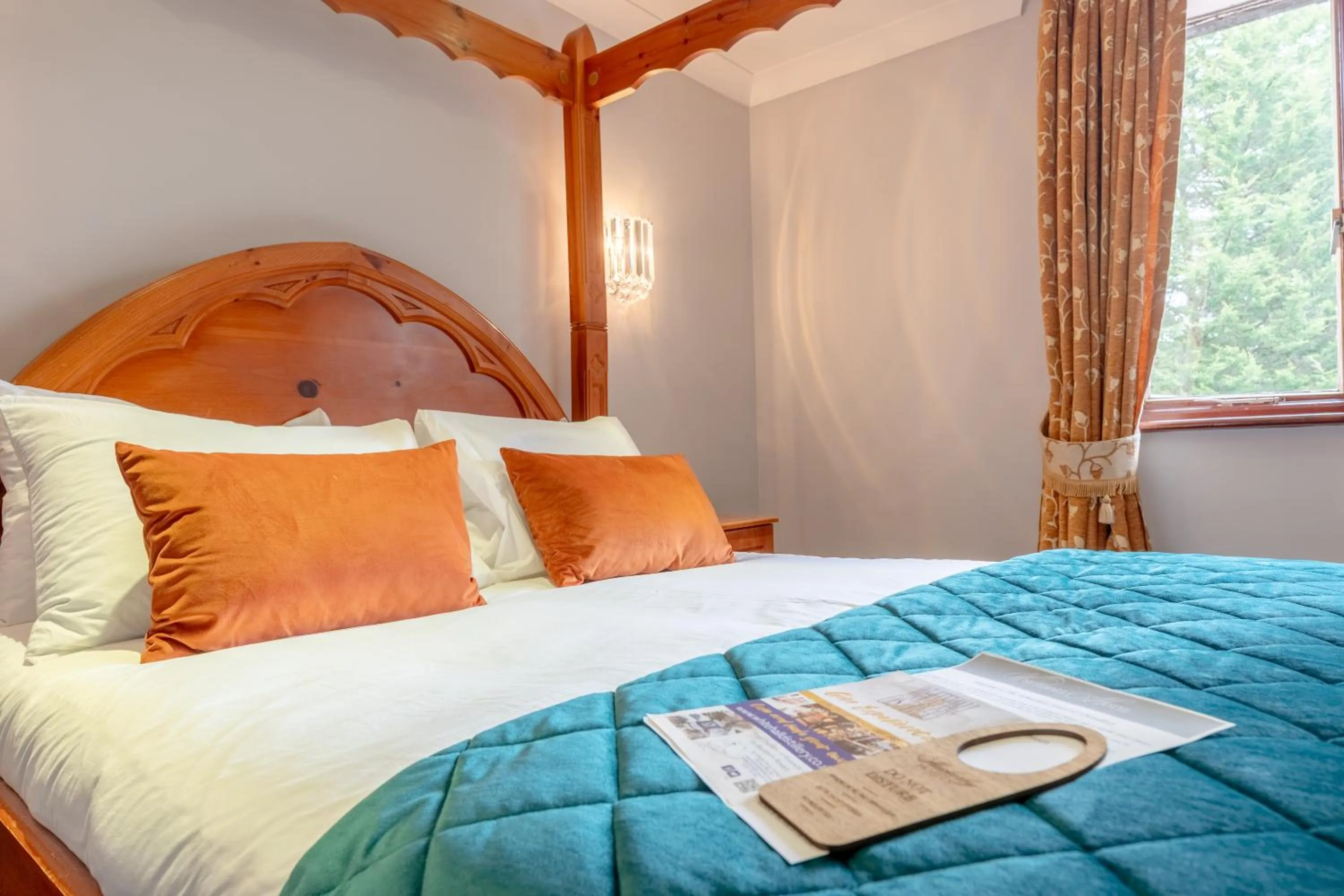 Bed in The Whitehall Hotel & Distillery