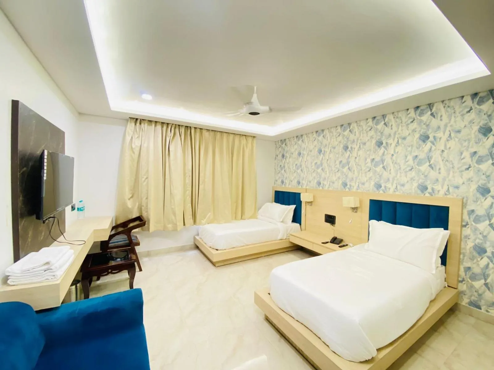 Bed in Hotel Holiday Grand