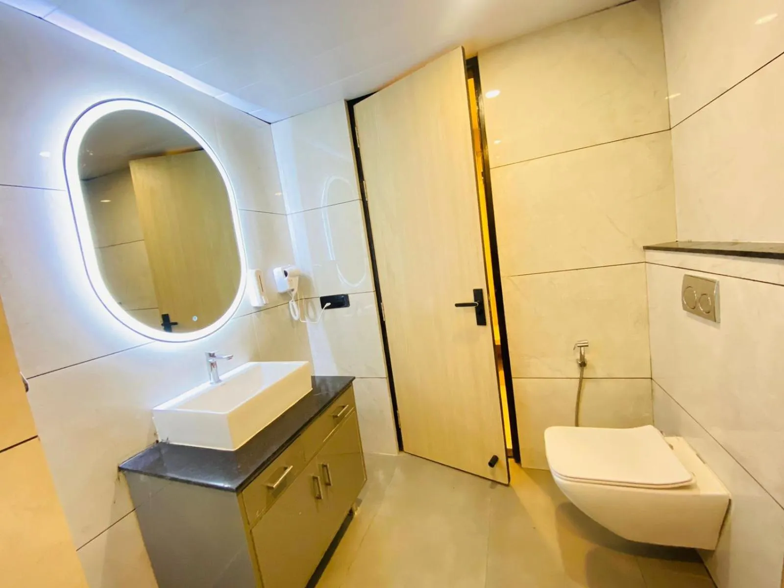 Bathroom in Hotel Holiday Grand