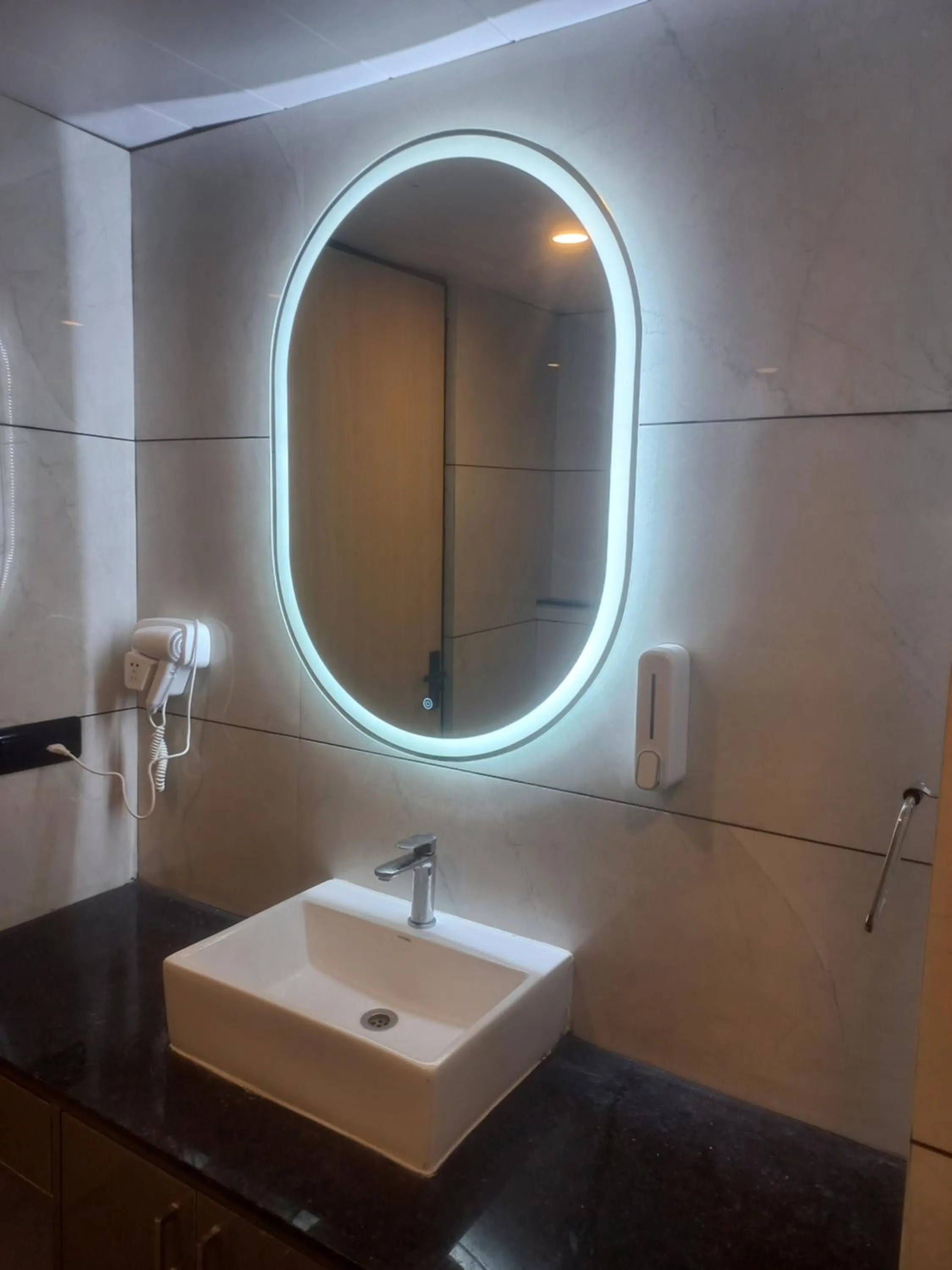 Bathroom in Hotel Holiday Grand