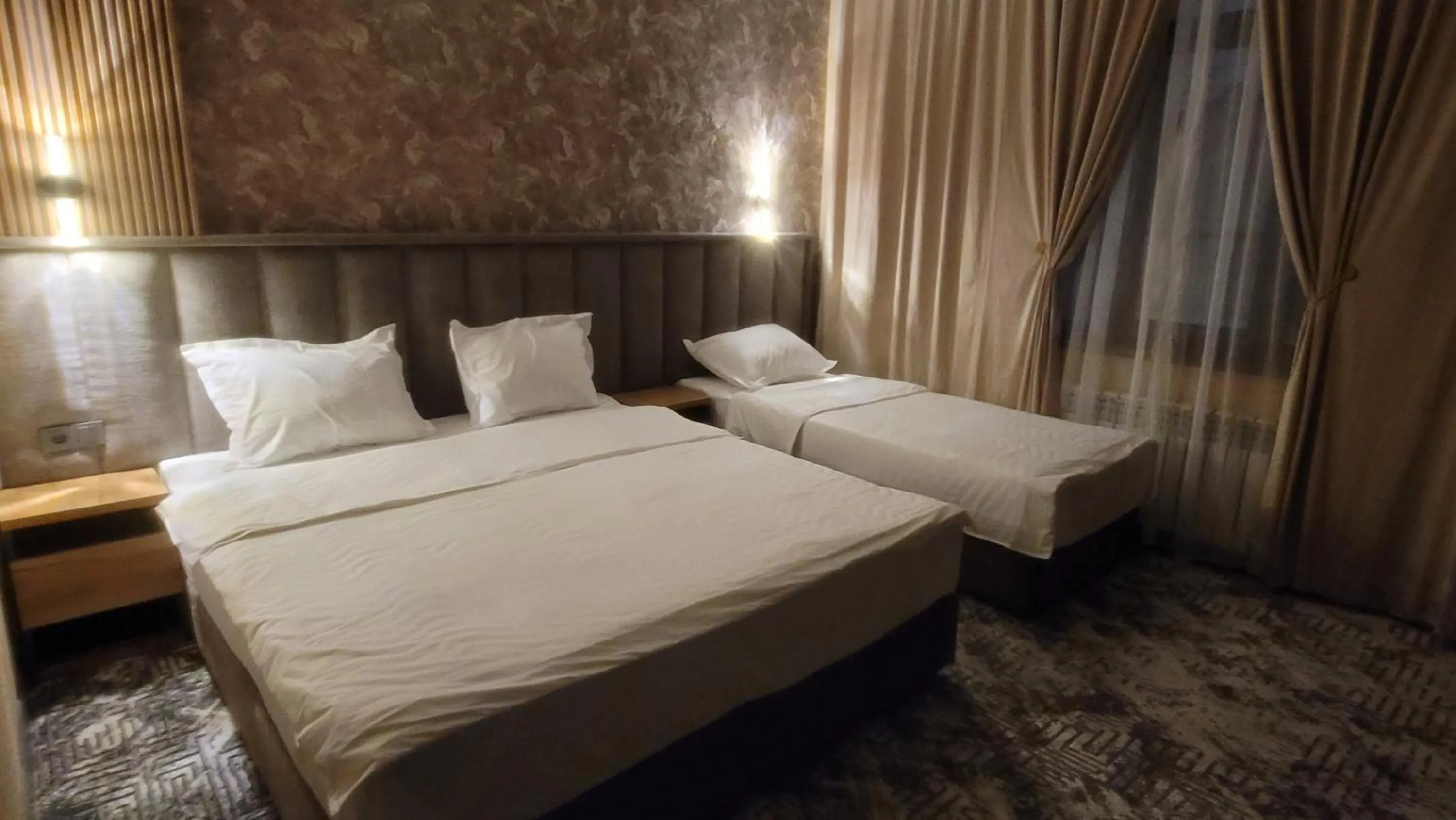 Bed in Homy House Hotel