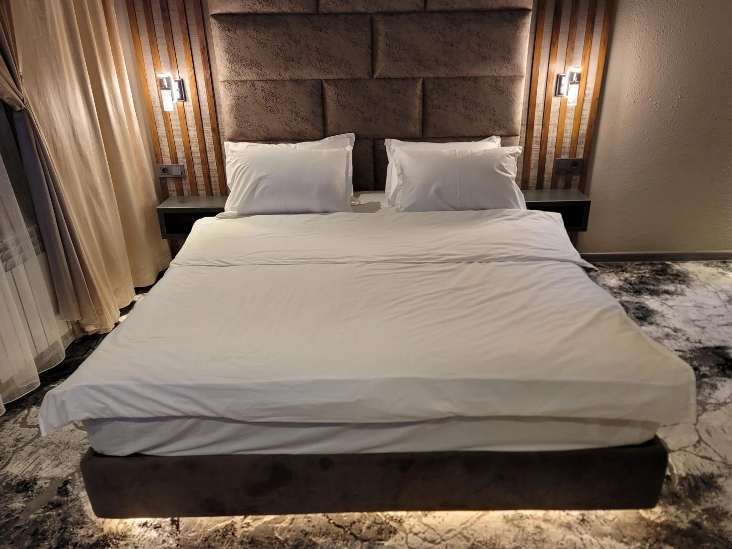Bed in Homy House Hotel