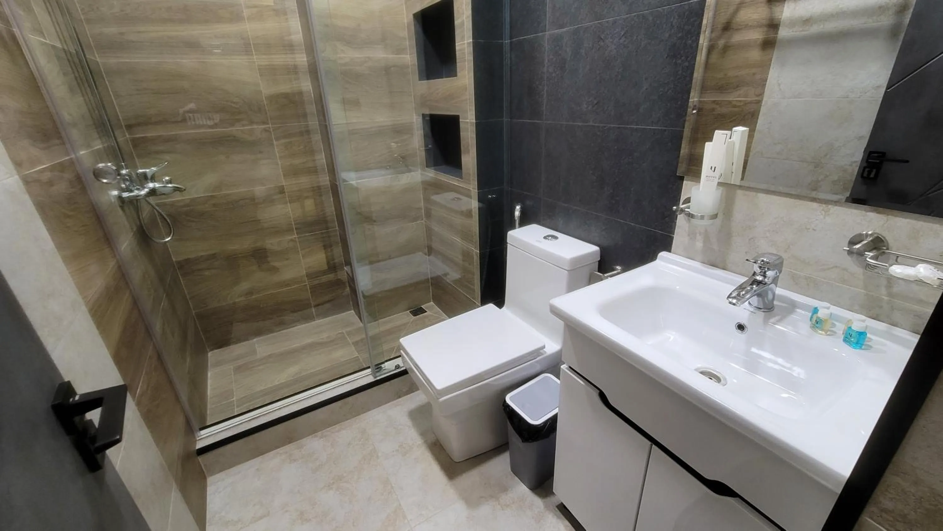 Shower in Homy House Hotel